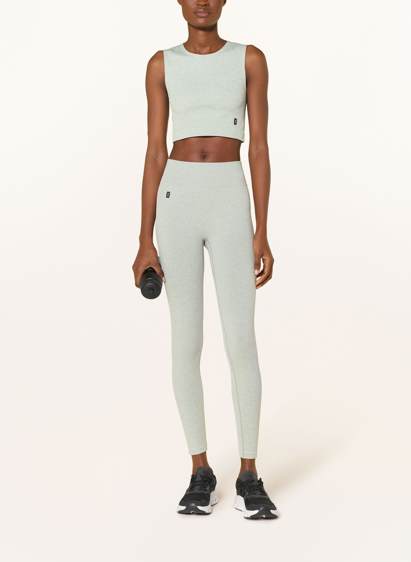 On STUDIO Tights: MINT