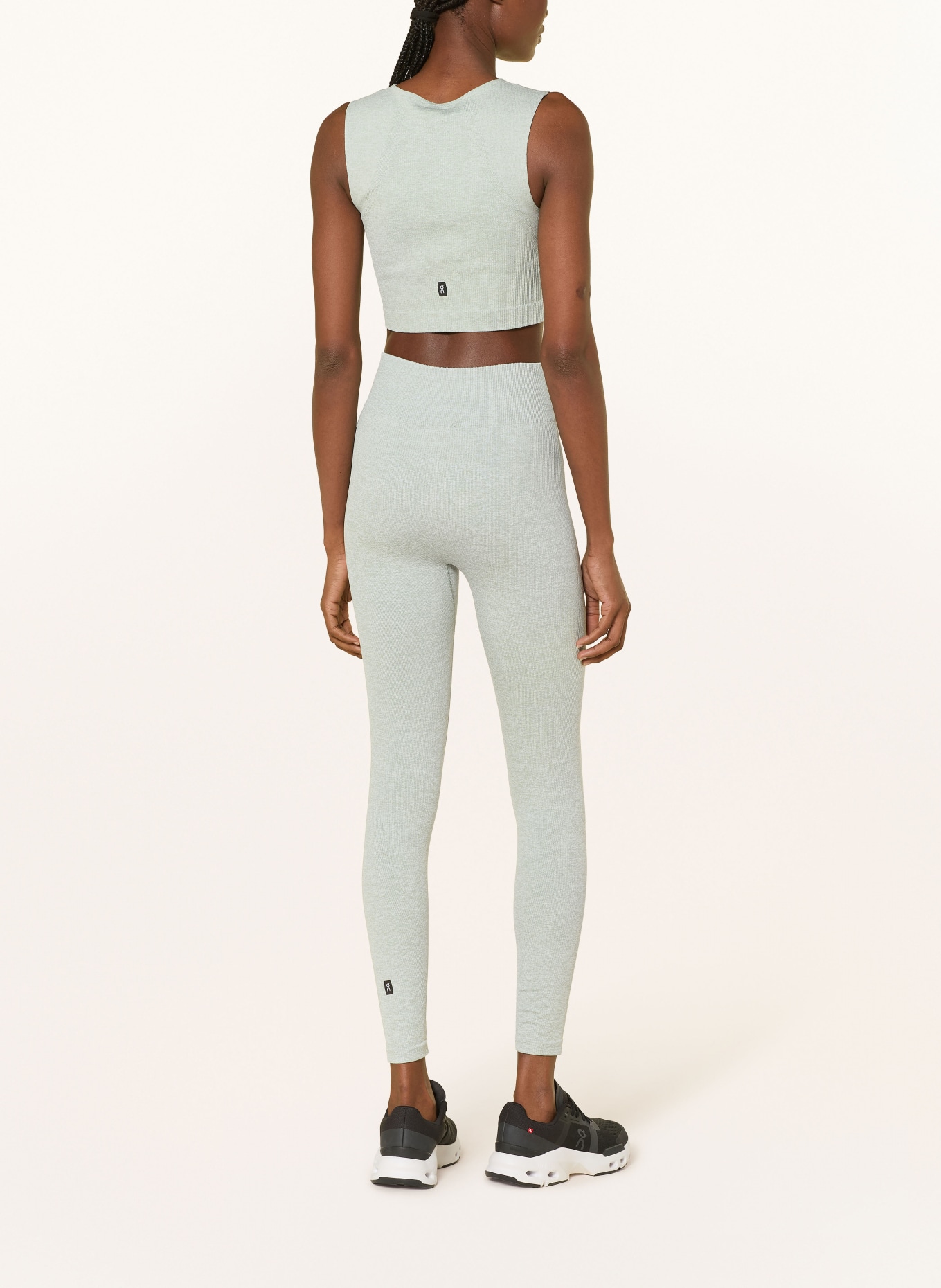 On STUDIO Tights: MINT