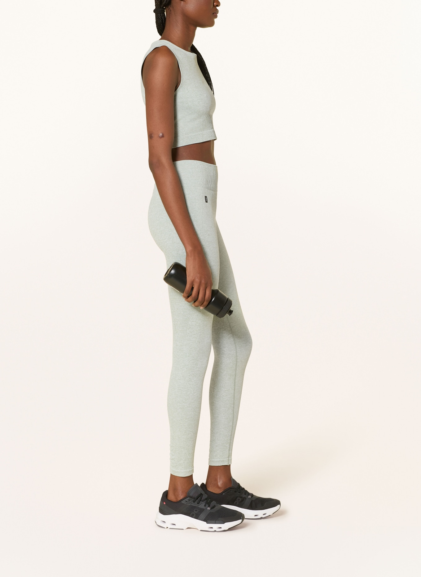 On STUDIO Tights: MINT