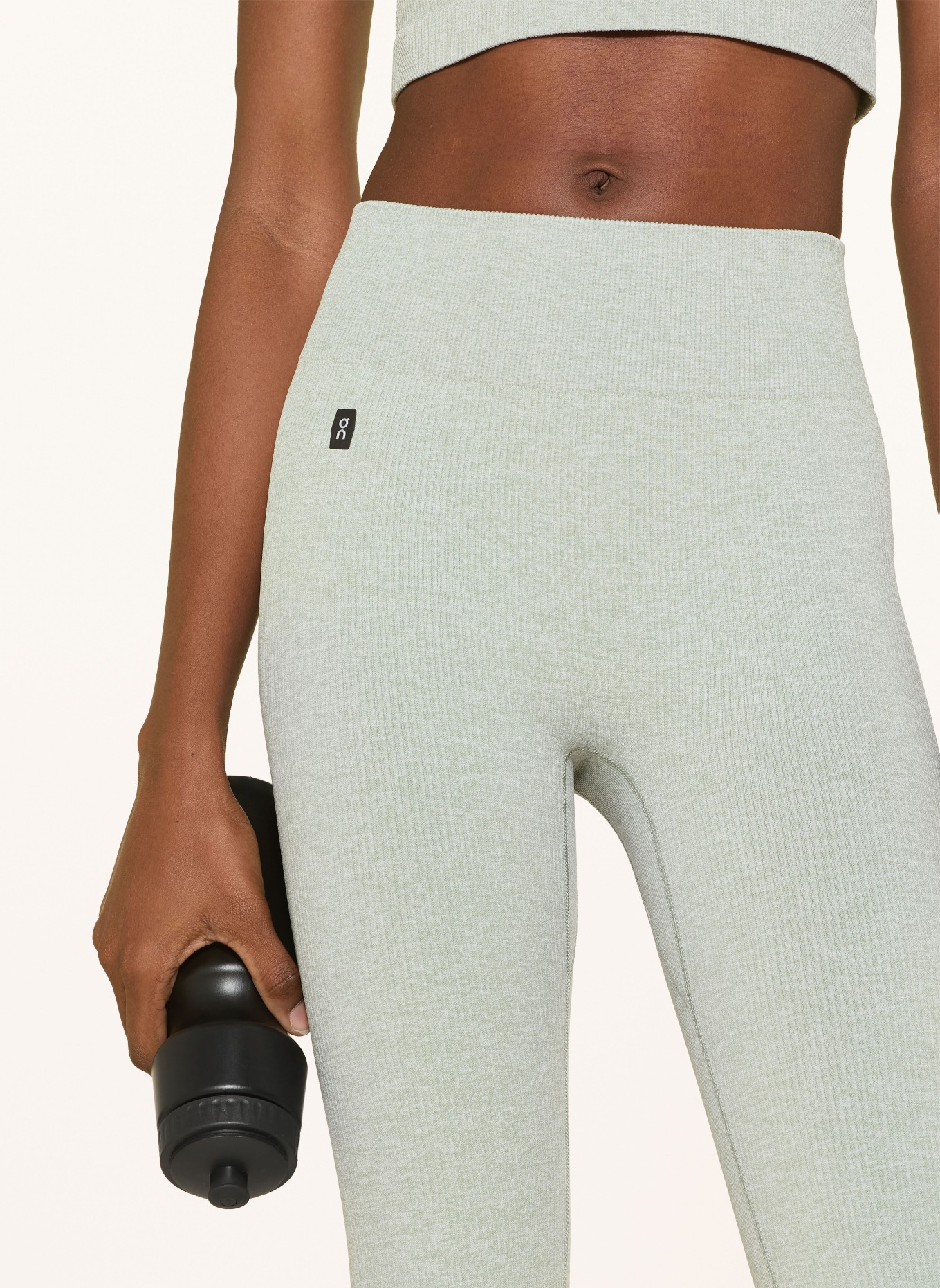 On STUDIO Tights: MINT