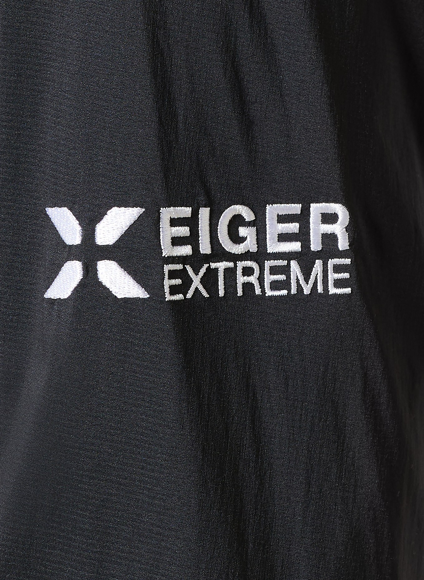 MAMMUT Veste hybride EIGER NORDWAND en FLEX AIR HYBRID: NOIR / BLANC