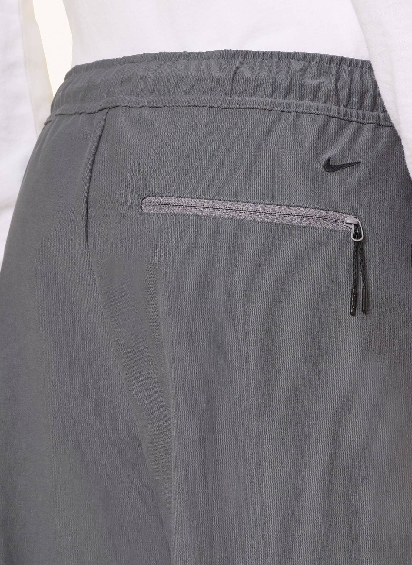 Nike SHORI-trainingsbroek van gemengde stoffen: GRIJS