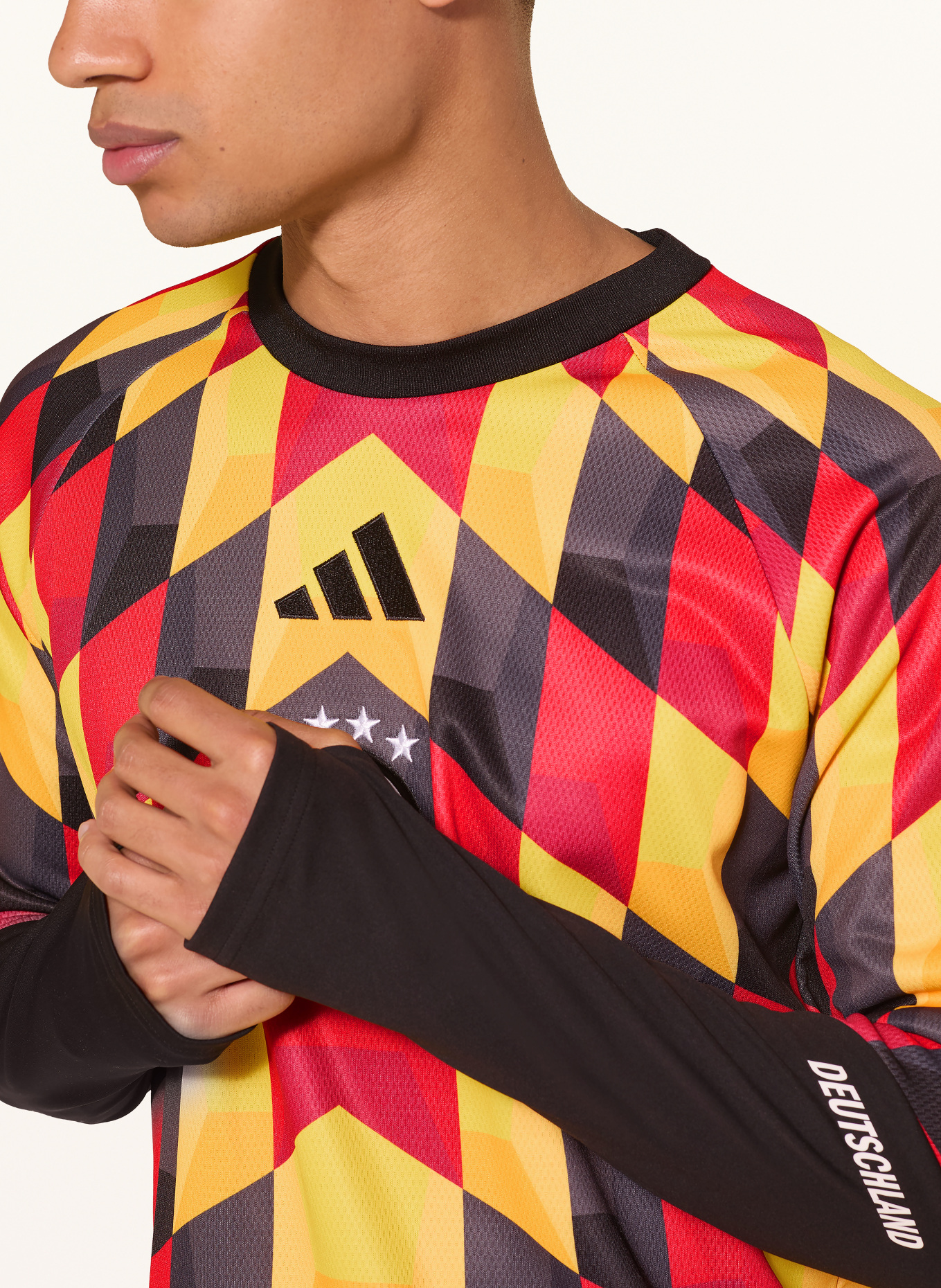 adidas Warmlooptrui DUITSLAND 2026 THUIS: ZWART / ROOD / GEEL