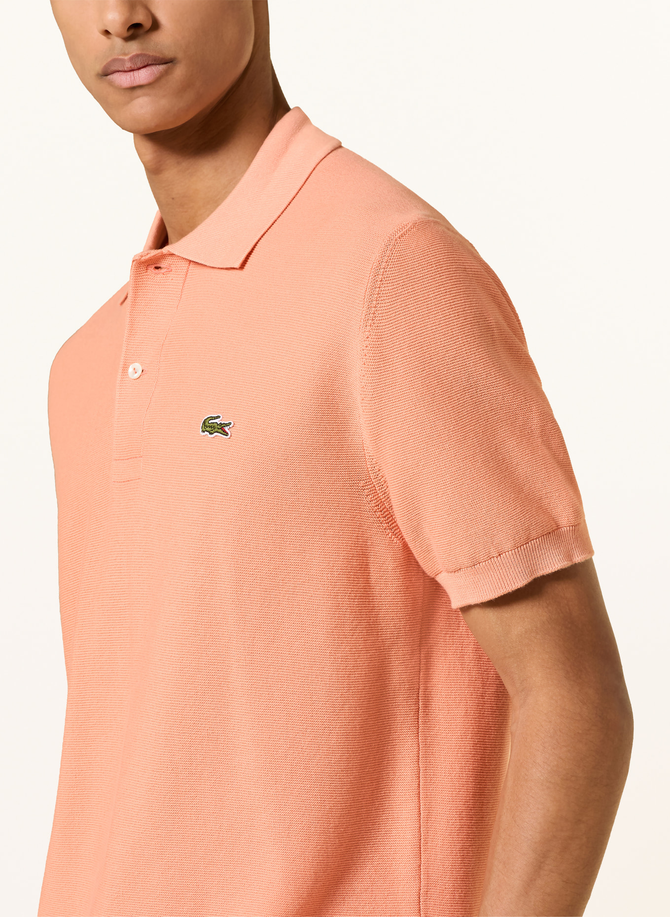 LACOSTE Polo en maille coupe classique: SAUMON