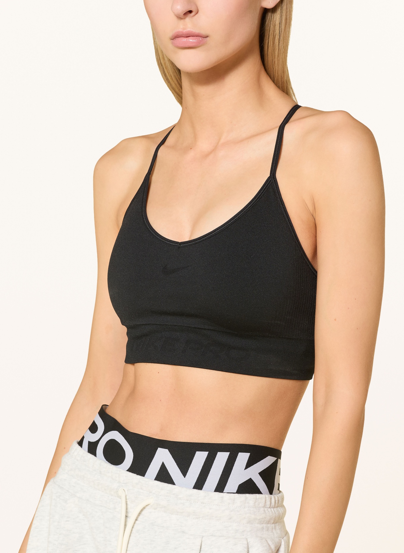 Nike Sportovní podprsenka PRO SEAMLESS: ČERNÁ