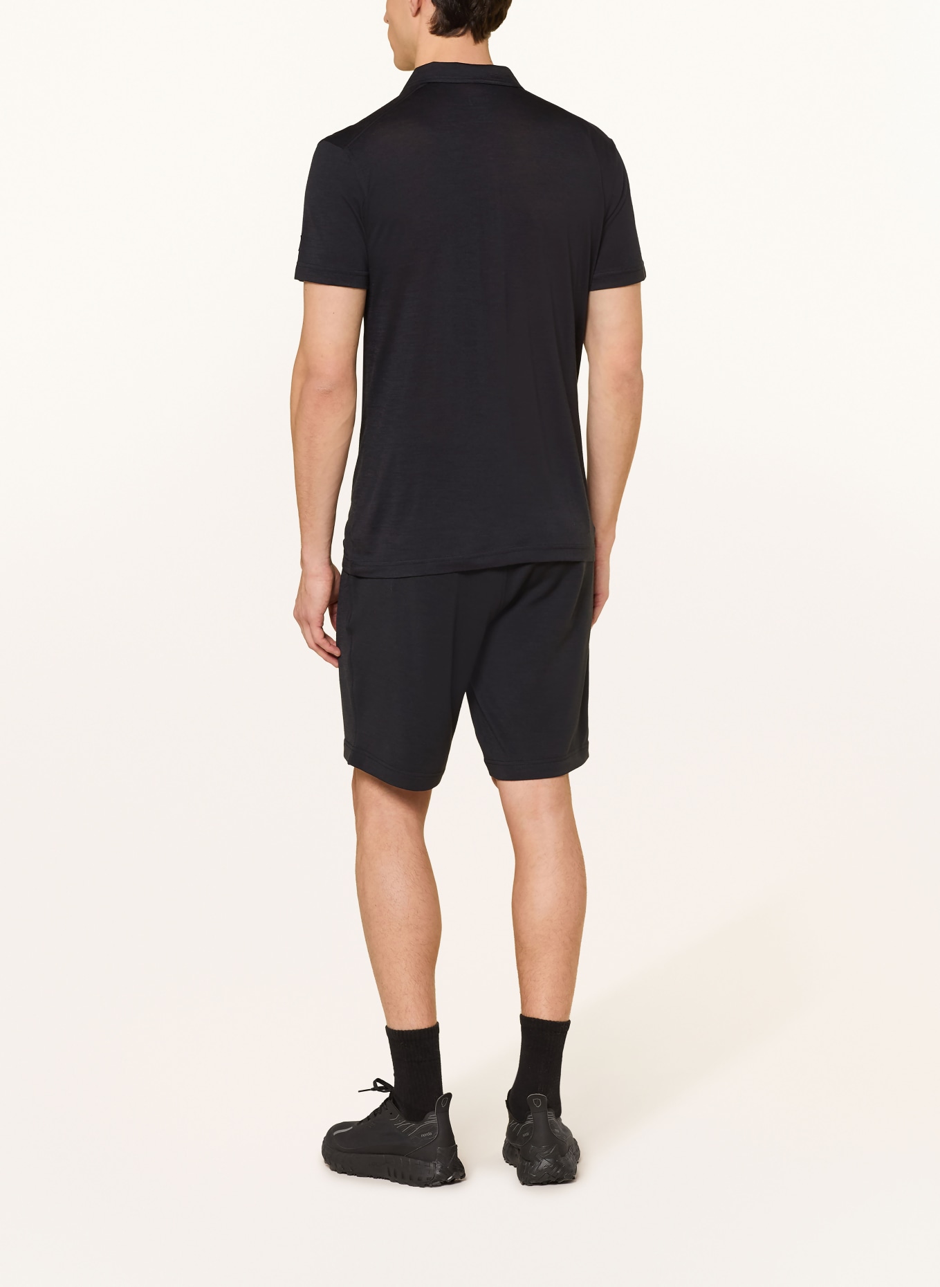 super.natural Funktions-Poloshirt mit Merinowolle: SCHWARZ