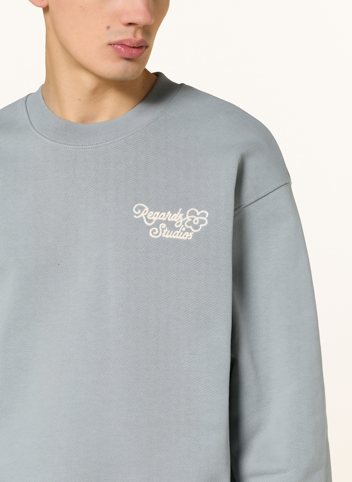 REGARDS Sweatshirt FLOWER ICON '26: HELLBLAU / CREME