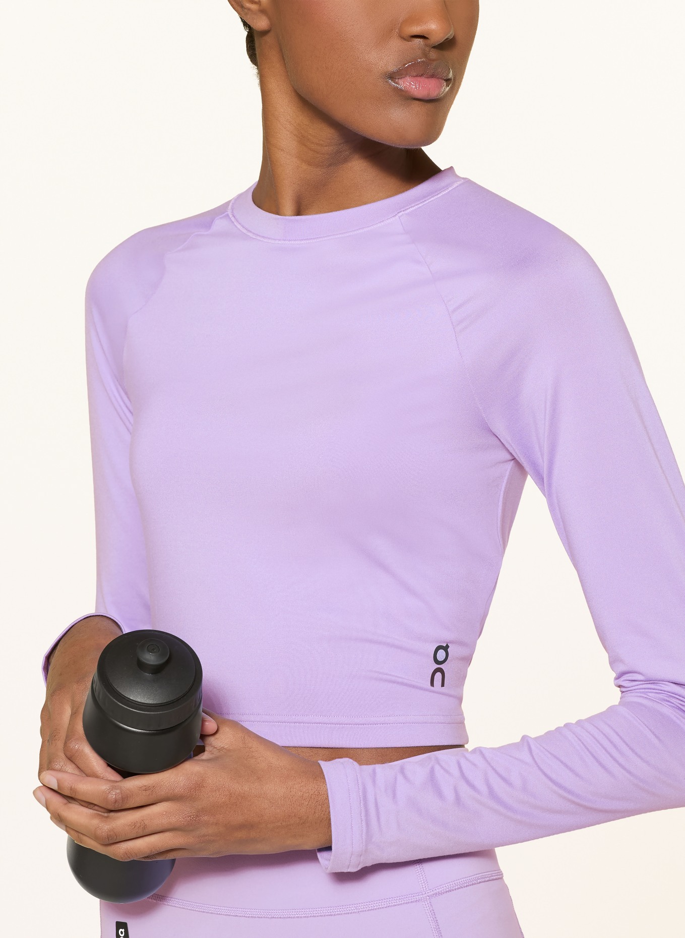 On STUDIO Cropped Long-Sleeve Top: LIGHT PURPLE