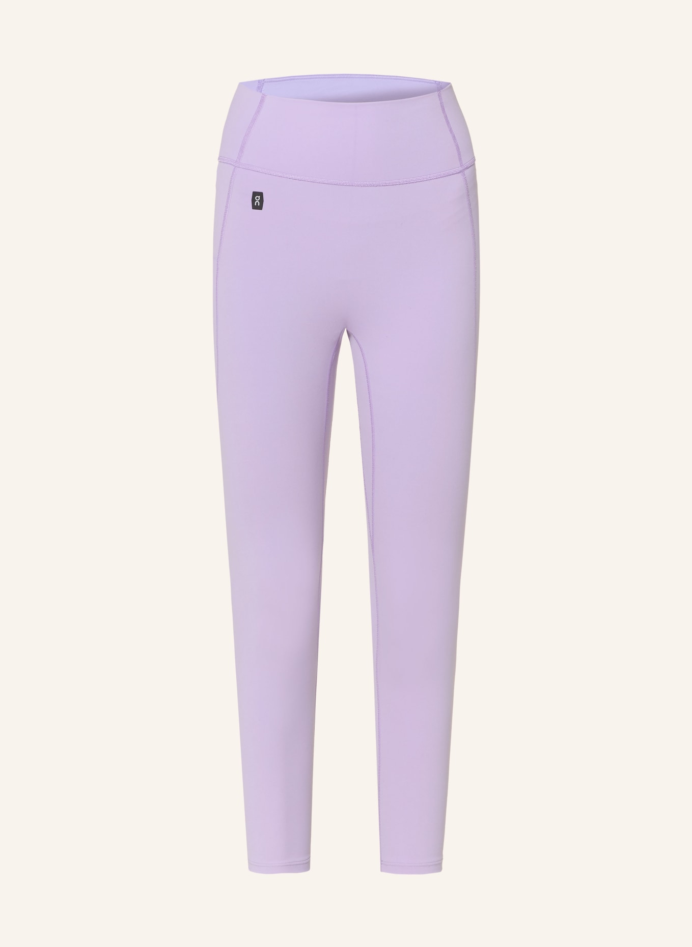 On STUDIO Tights: LIGHT PURPLE