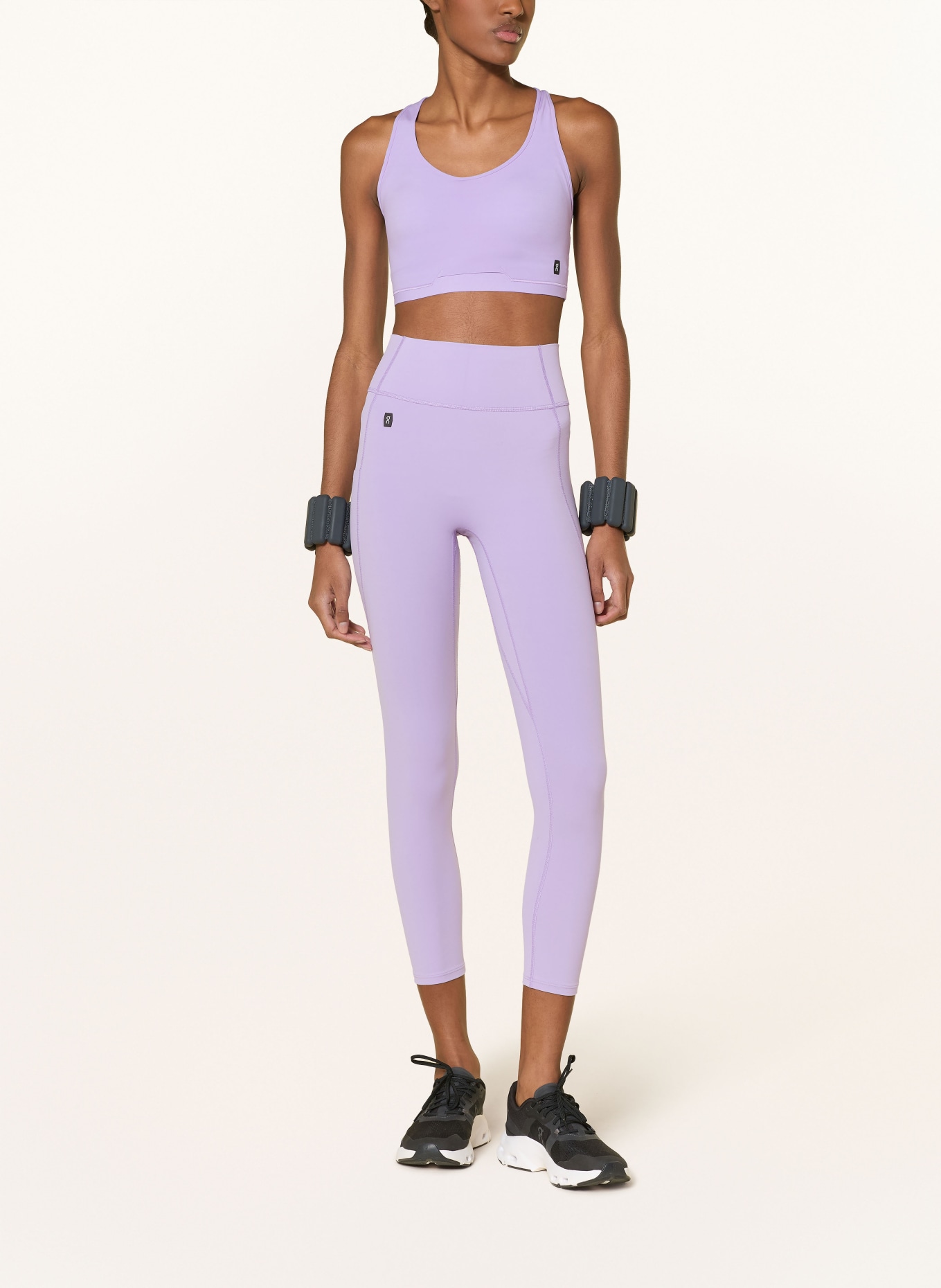 On STUDIO Tights: LIGHT PURPLE