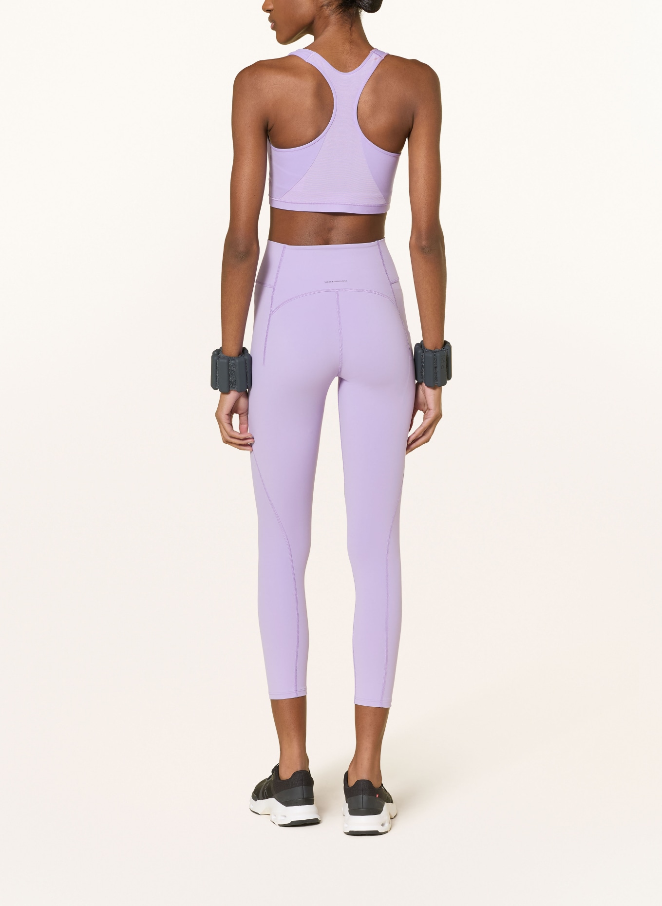 On STUDIO Tights: LIGHT PURPLE