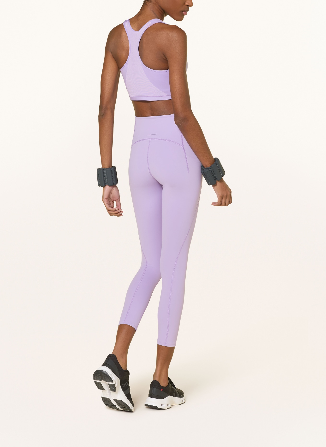 On STUDIO Tights: LIGHT PURPLE