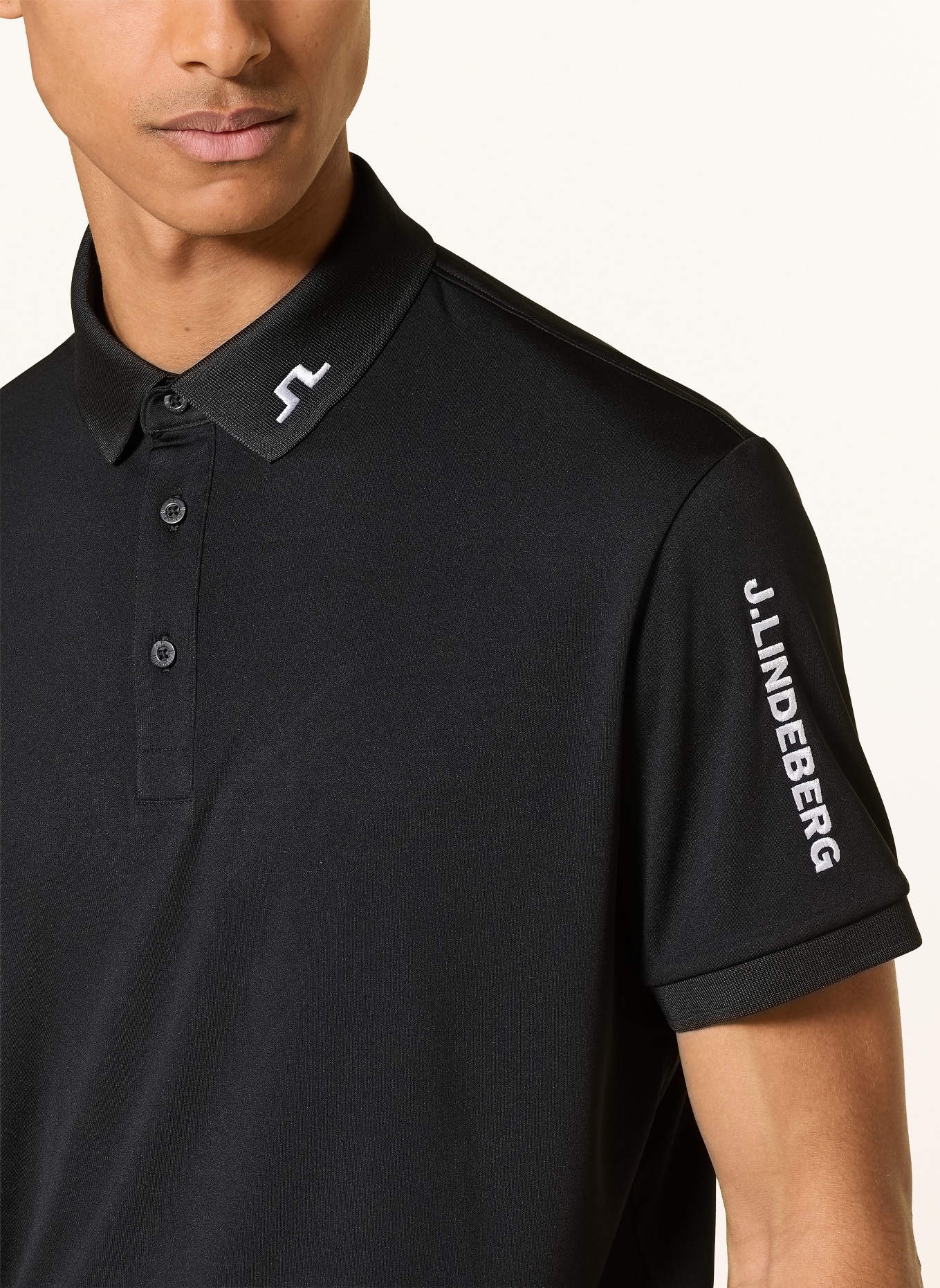 J.LINDEBERG Polo fonctionnel: NOIR / BLANC