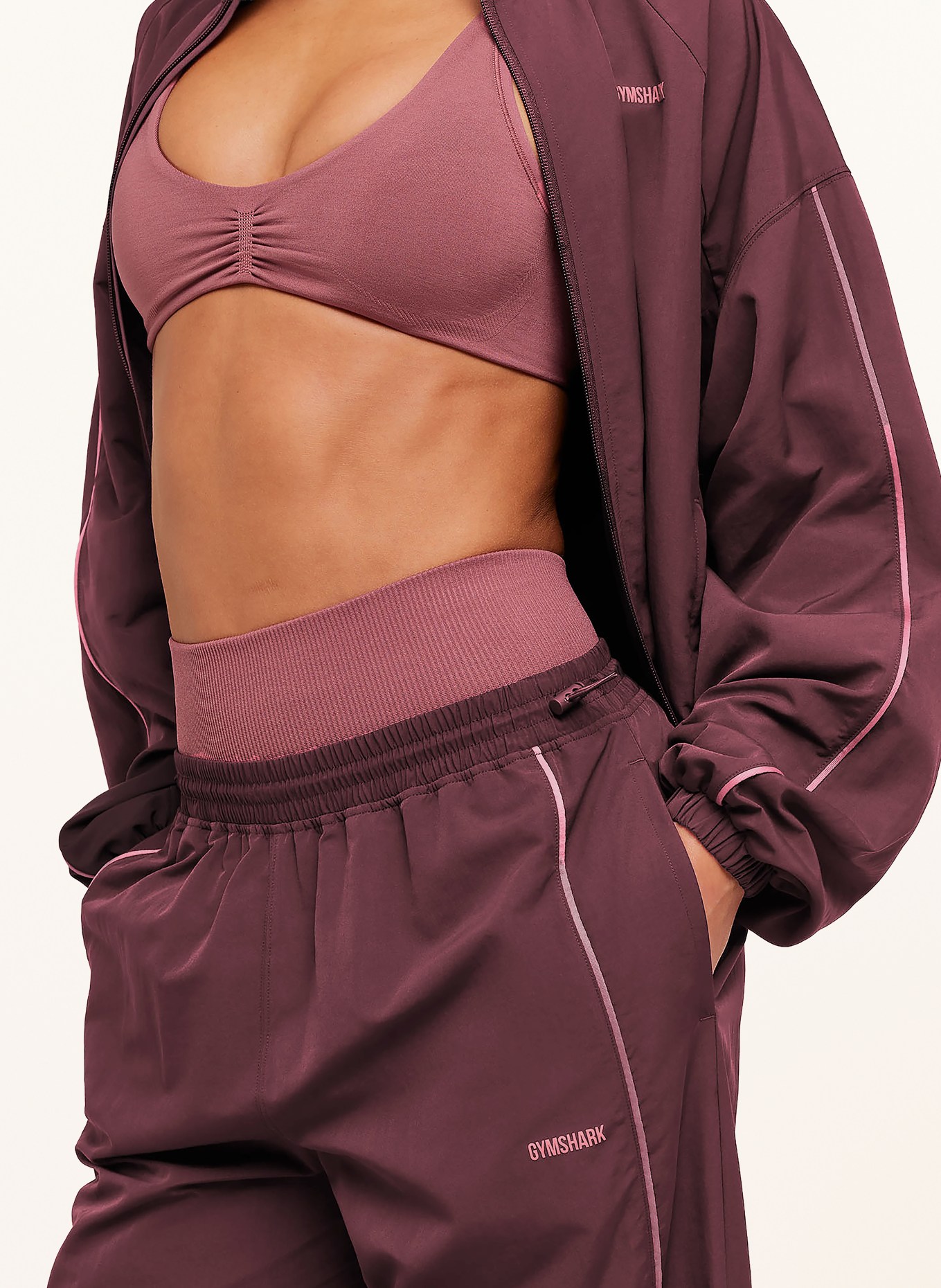 GYMSHARK Pantalon de survêtement TO FROM: ROUGE FONCÉ / ROUGE CLAIR