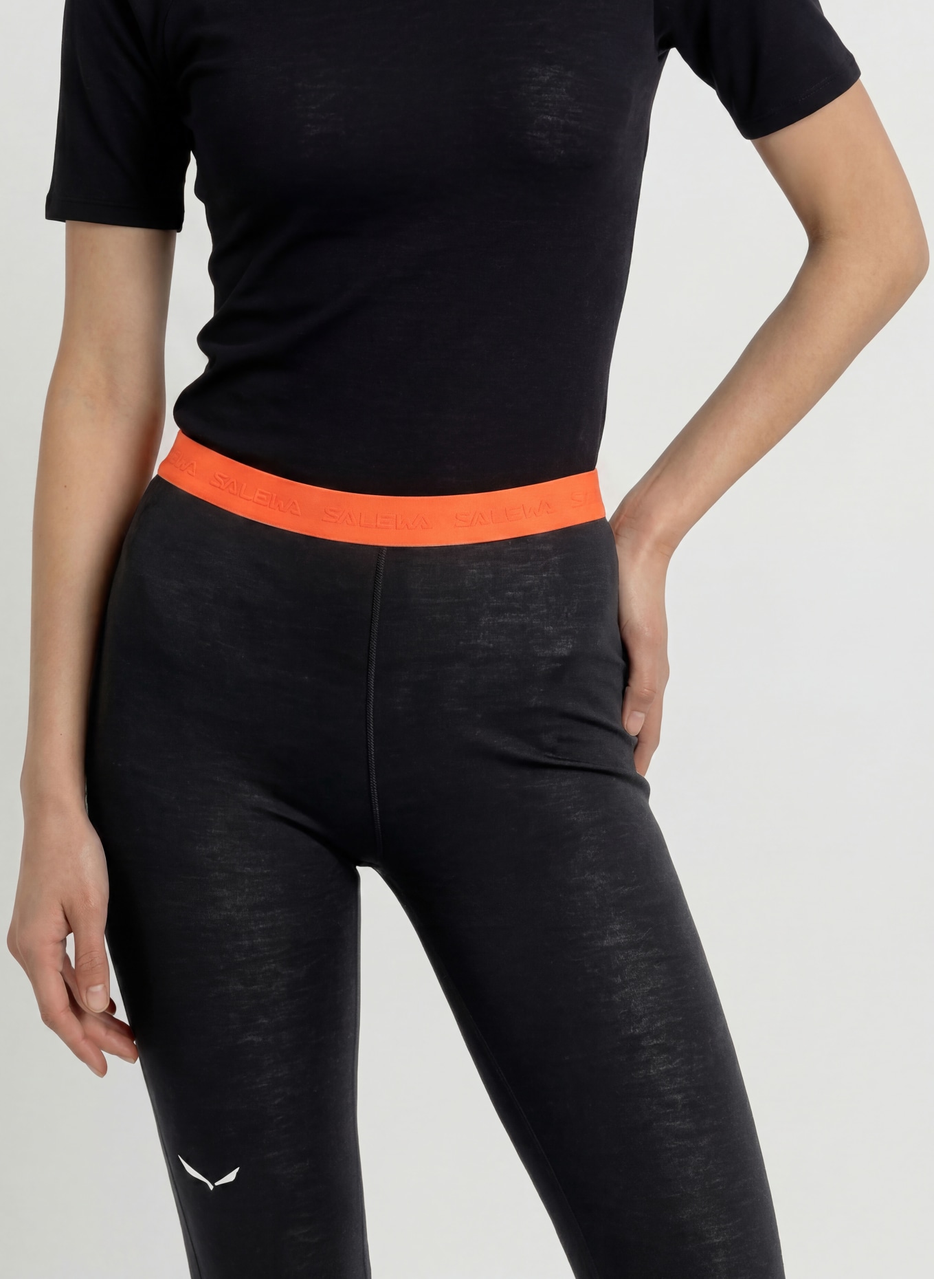 SALEWA Pantalon fonctionnel CRISTALLO en laine mérinos, longueur raccourcie: NOIR / ORANGE FLUO