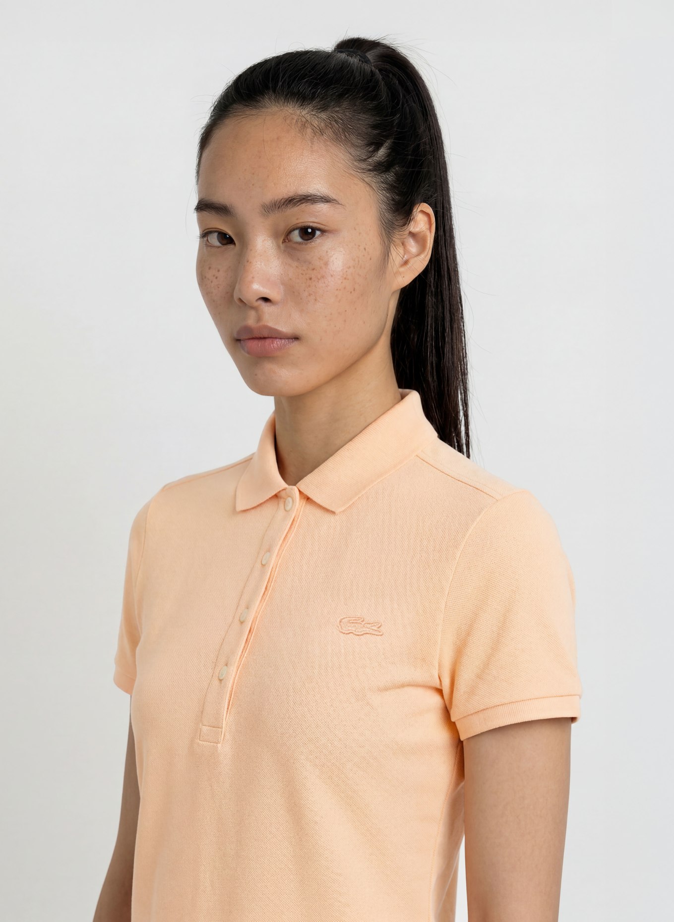 LACOSTE Piqué-Poloshirt: HELLORANGE
