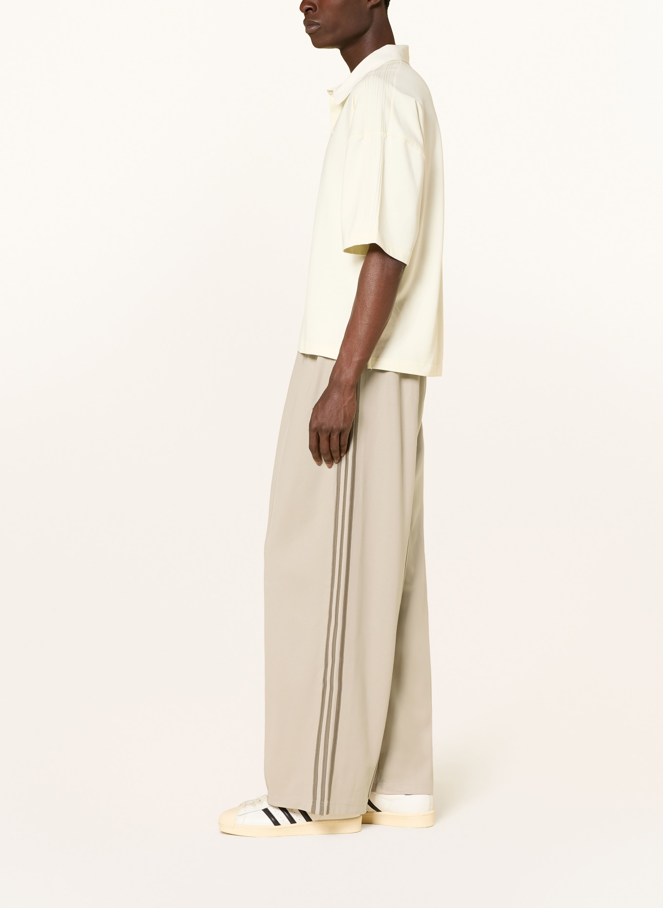 adidas Originals Sweatpants with braided stripes: BEIGE / TAUPE