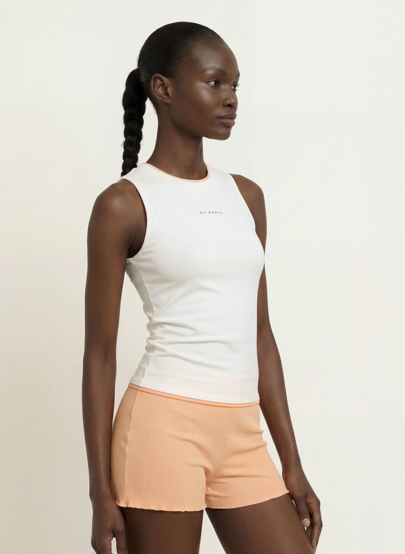 OH APRIL Top AMEA: WIT / LICHTORANJE