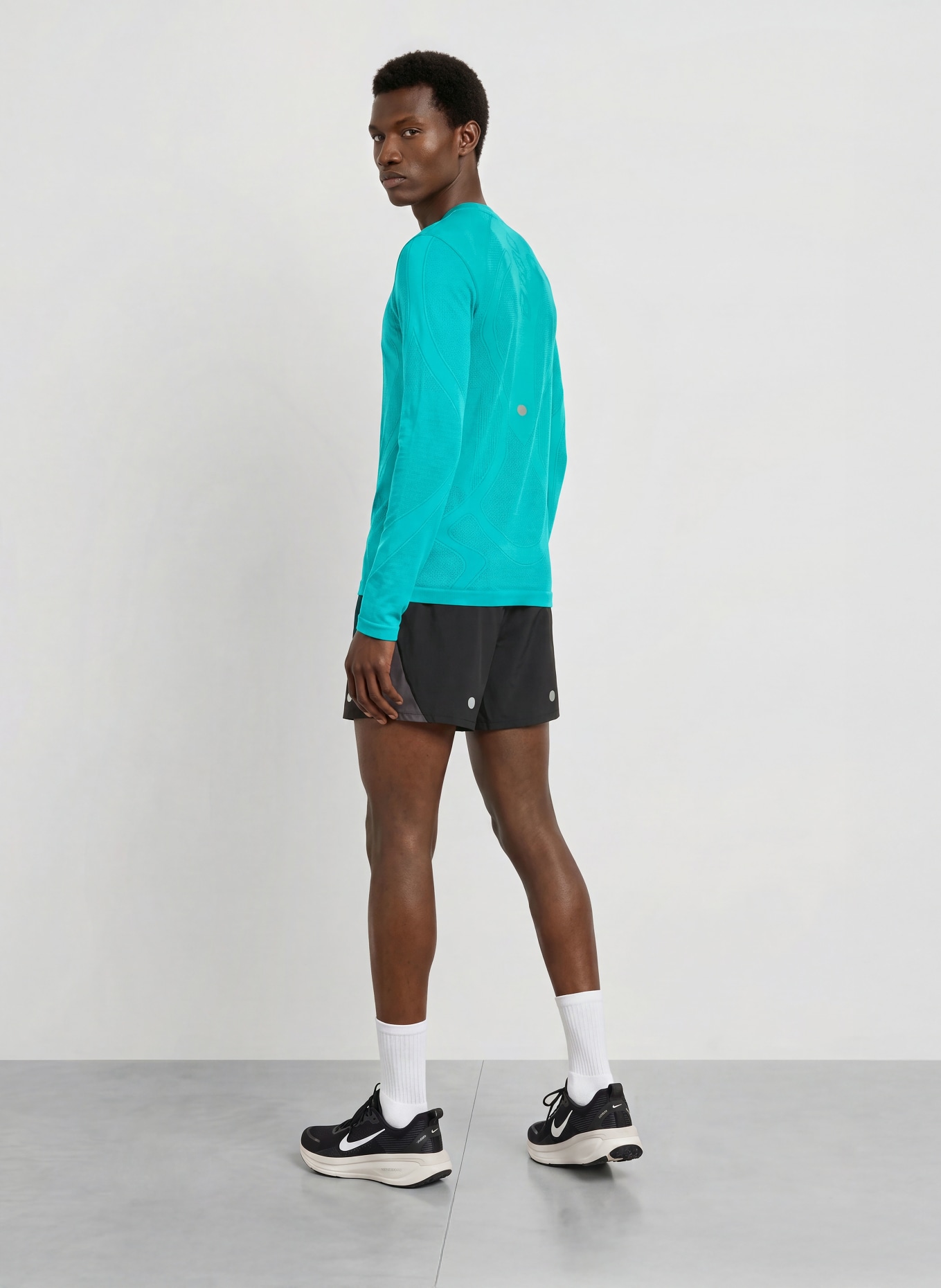 ASICS ROAD SEAMLESS LS running shirt: NEON TURQUOISE