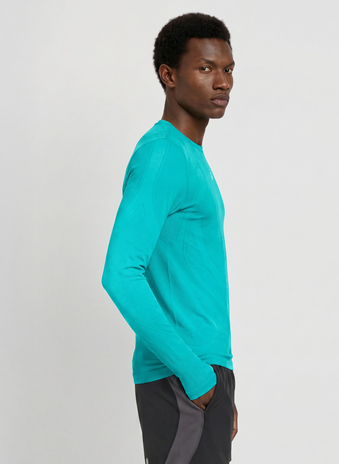 ASICS ROAD SEAMLESS LS running shirt: NEON TURQUOISE