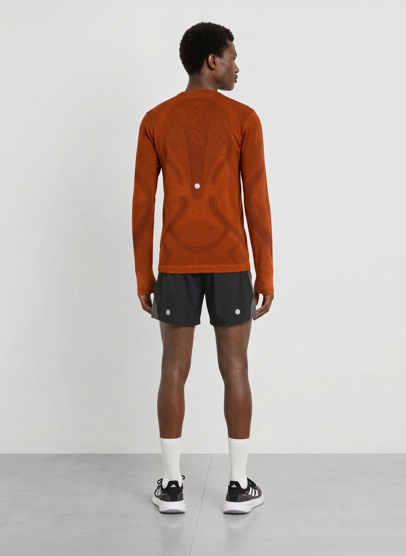 ASICS ROAD SEAMLESS LS running shirt: RED / DARK RED