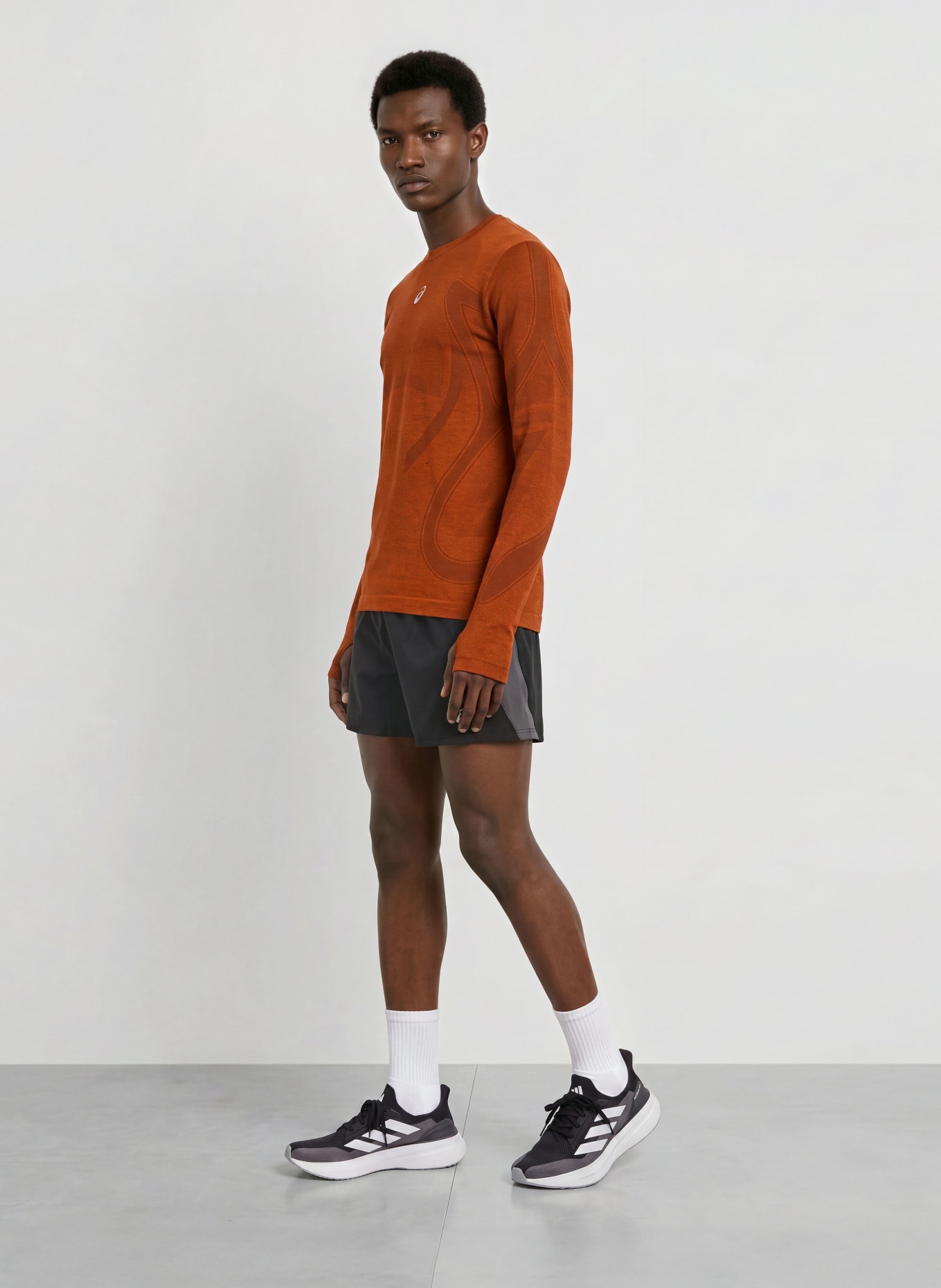 ASICS ROAD SEAMLESS LS running shirt: RED / DARK RED
