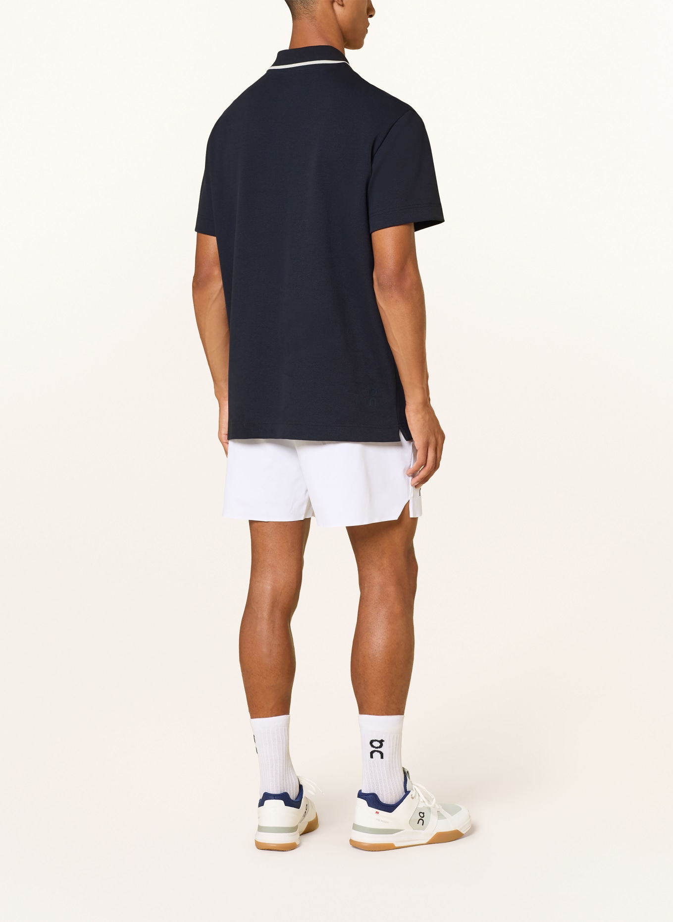 On Piqué-poloshirt COURTSIDE: DONKERBLAUW