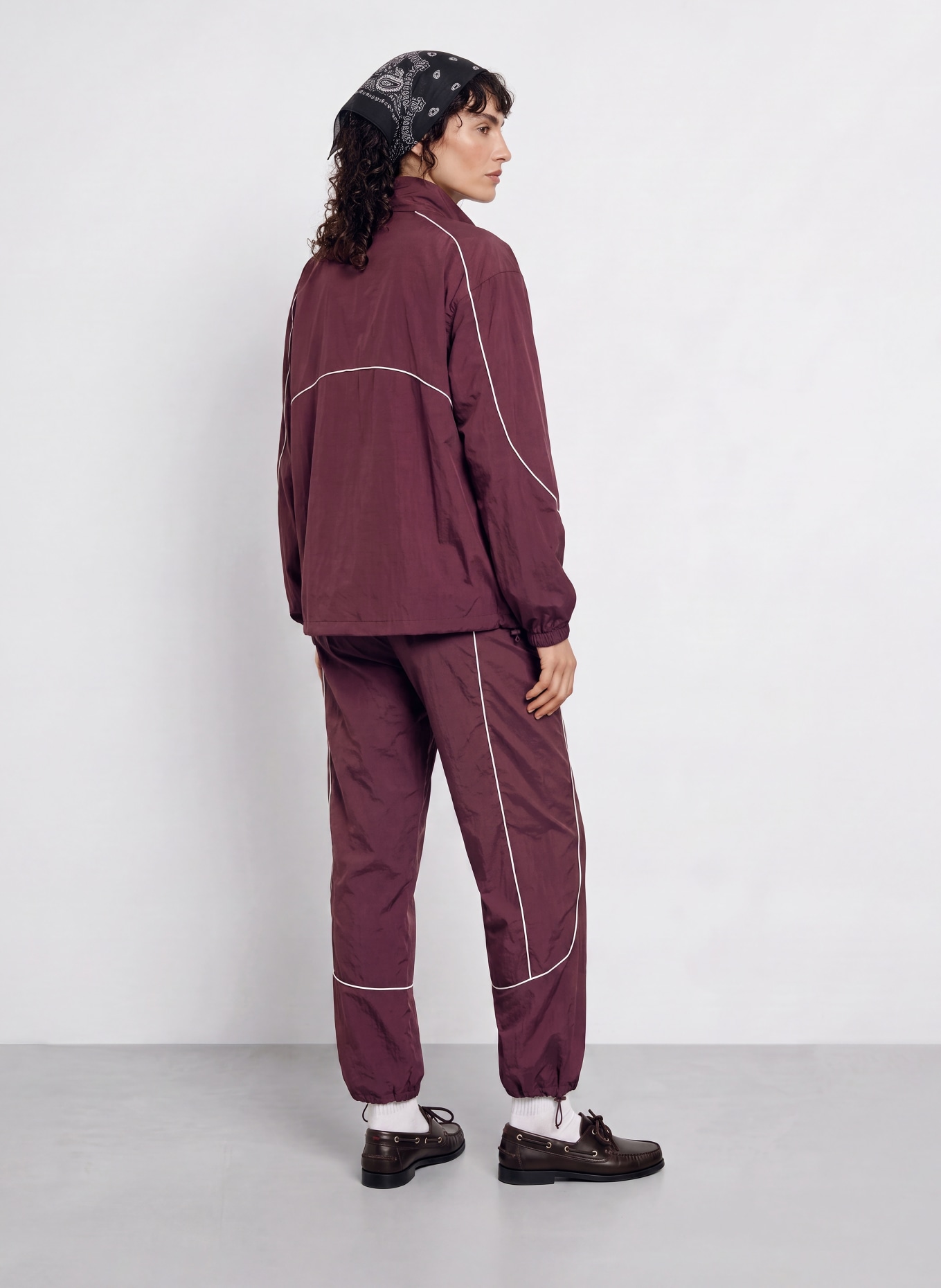UNDER ARMOUR Trackpants UA UNSTOPPABLE: DONKERROOD / WIT