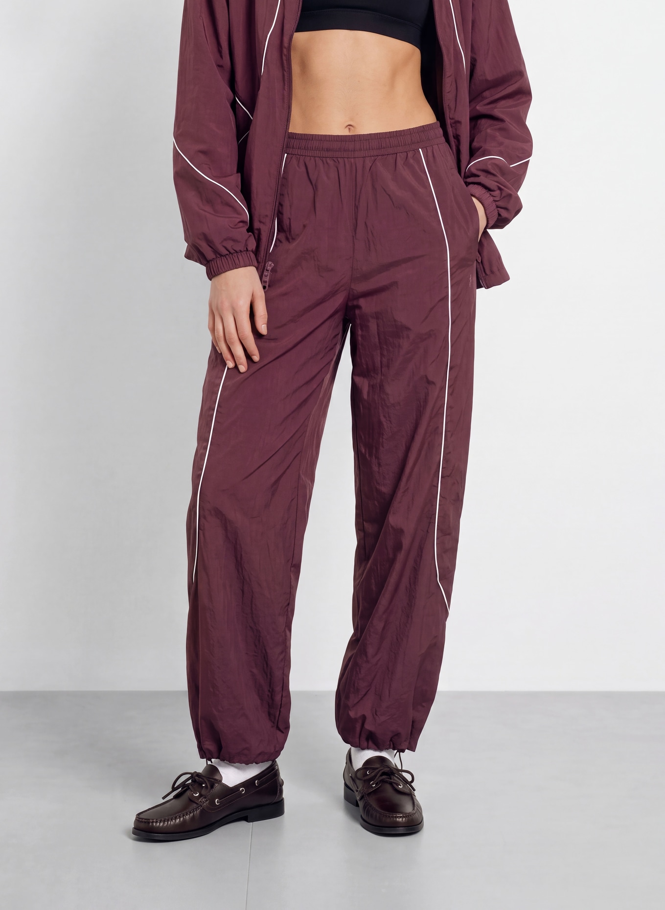 UNDER ARMOUR Trackpants UA UNSTOPPABLE: DONKERROOD / WIT