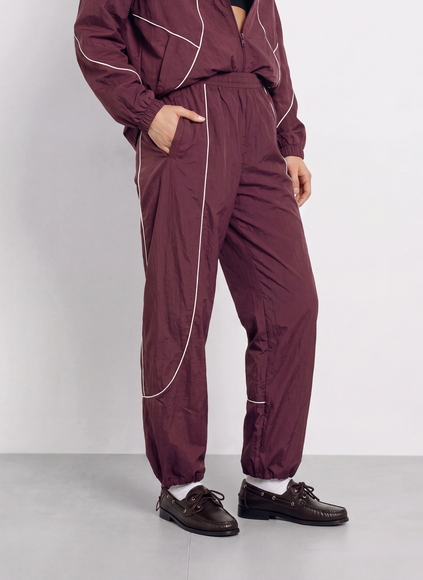 UNDER ARMOUR Trackpants UA UNSTOPPABLE: DONKERROOD / WIT