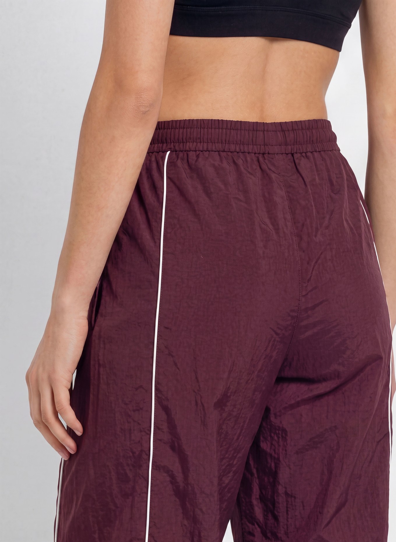 UNDER ARMOUR Trackpants UA UNSTOPPABLE: DONKERROOD / WIT