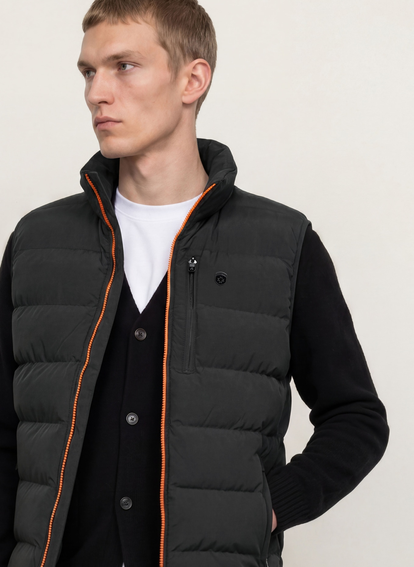 WELLENSTEYN Gewatteerd vest BLACKBIRD: ZWART / NEONORANJE