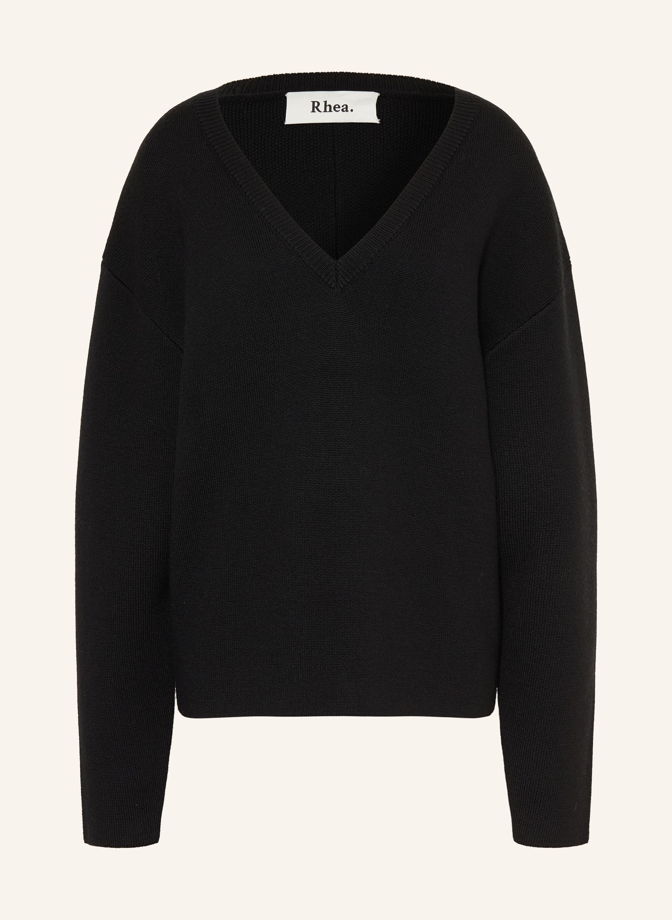 Rhea. Sweater: BLACK