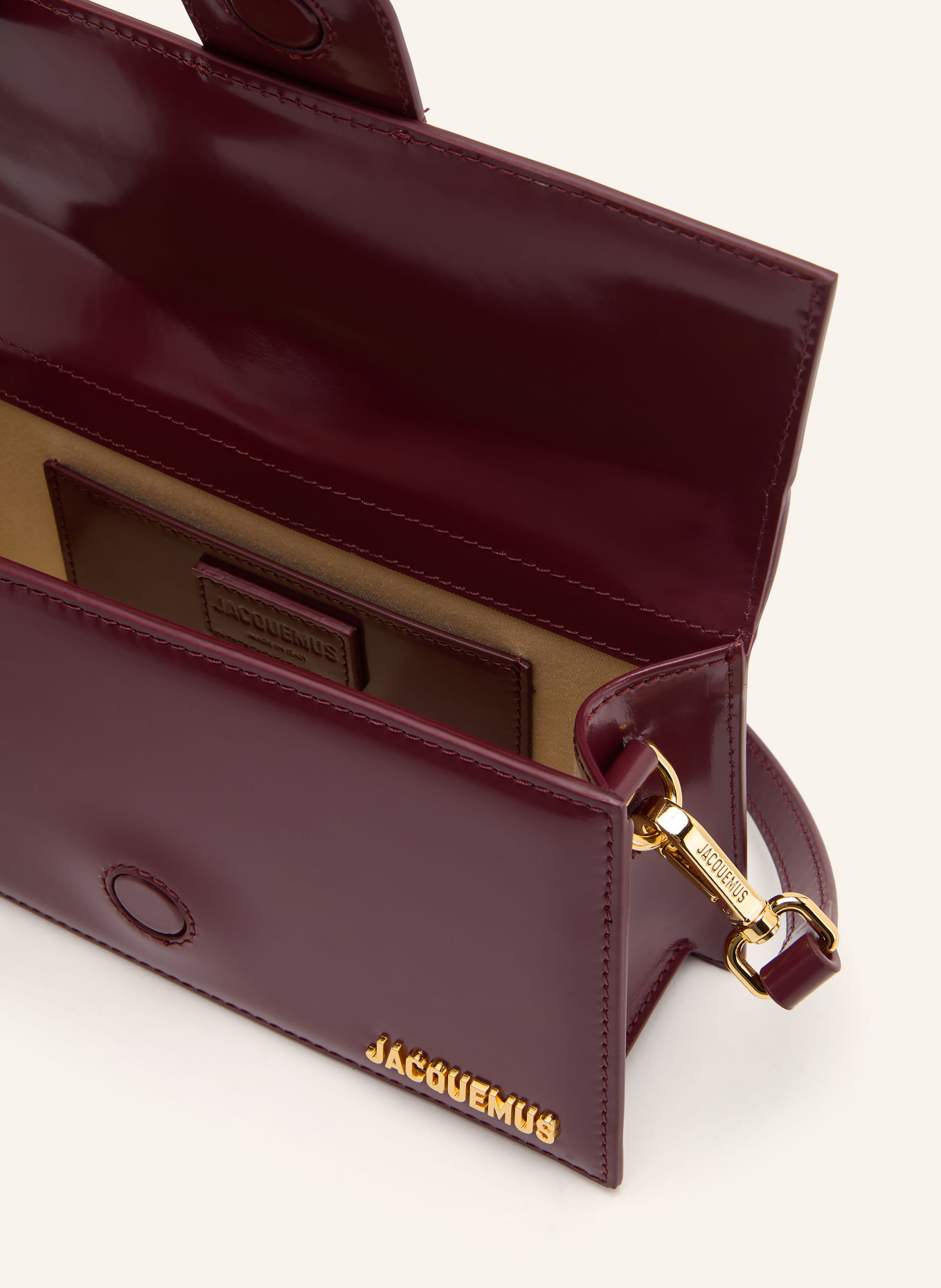 JACQUEMUS Schoudertas LE GRAND BAMBINO: DONKERROOD / GOUD