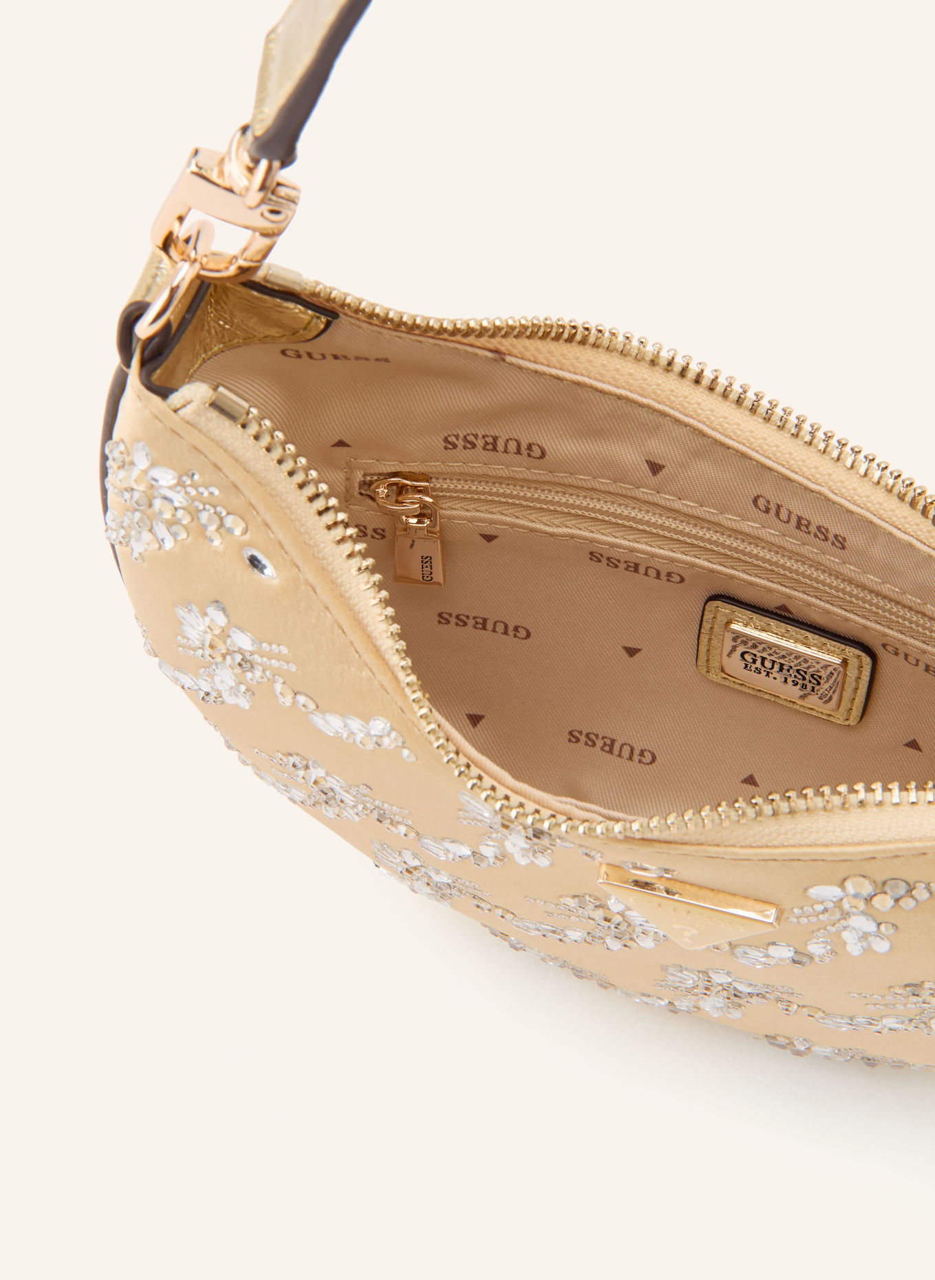 GUESS Handtasche TASMIN mit Schmucksteinen: GOLD / SILBER