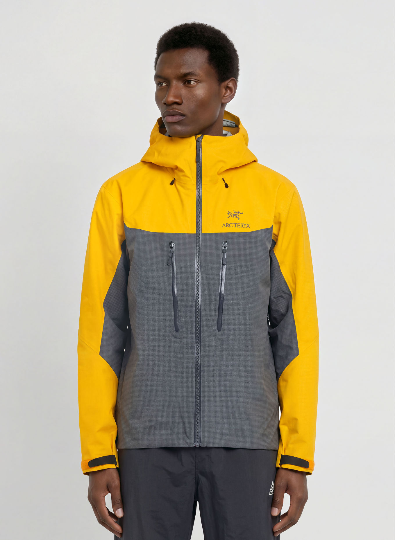 ARC'TERYX Hardshell-Jacke ALPHA: DUNKELGRAU / GELB