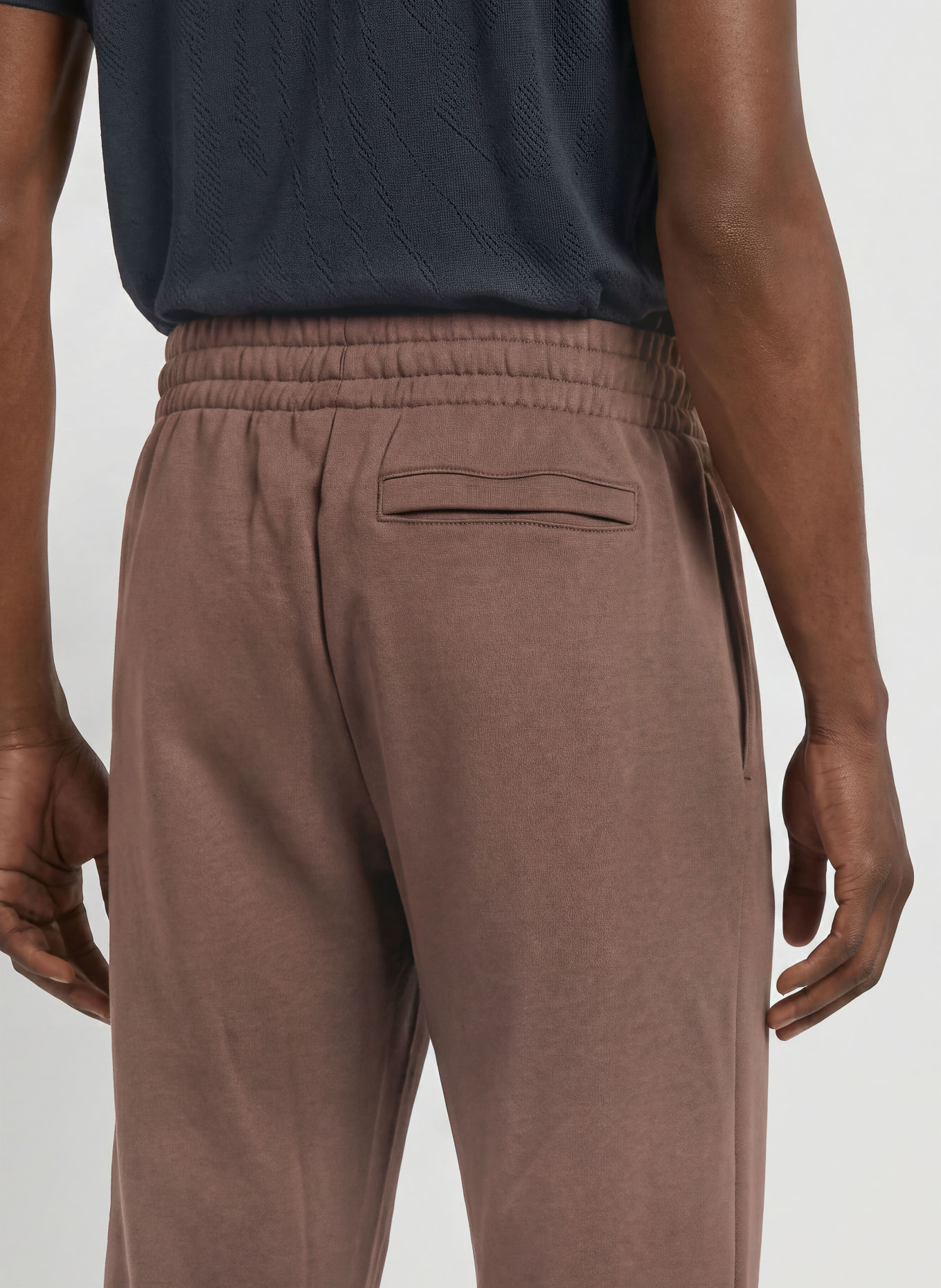 UNDER ARMOUR Sweatpants UA ICON FLEECE: DUNKELBRAUN