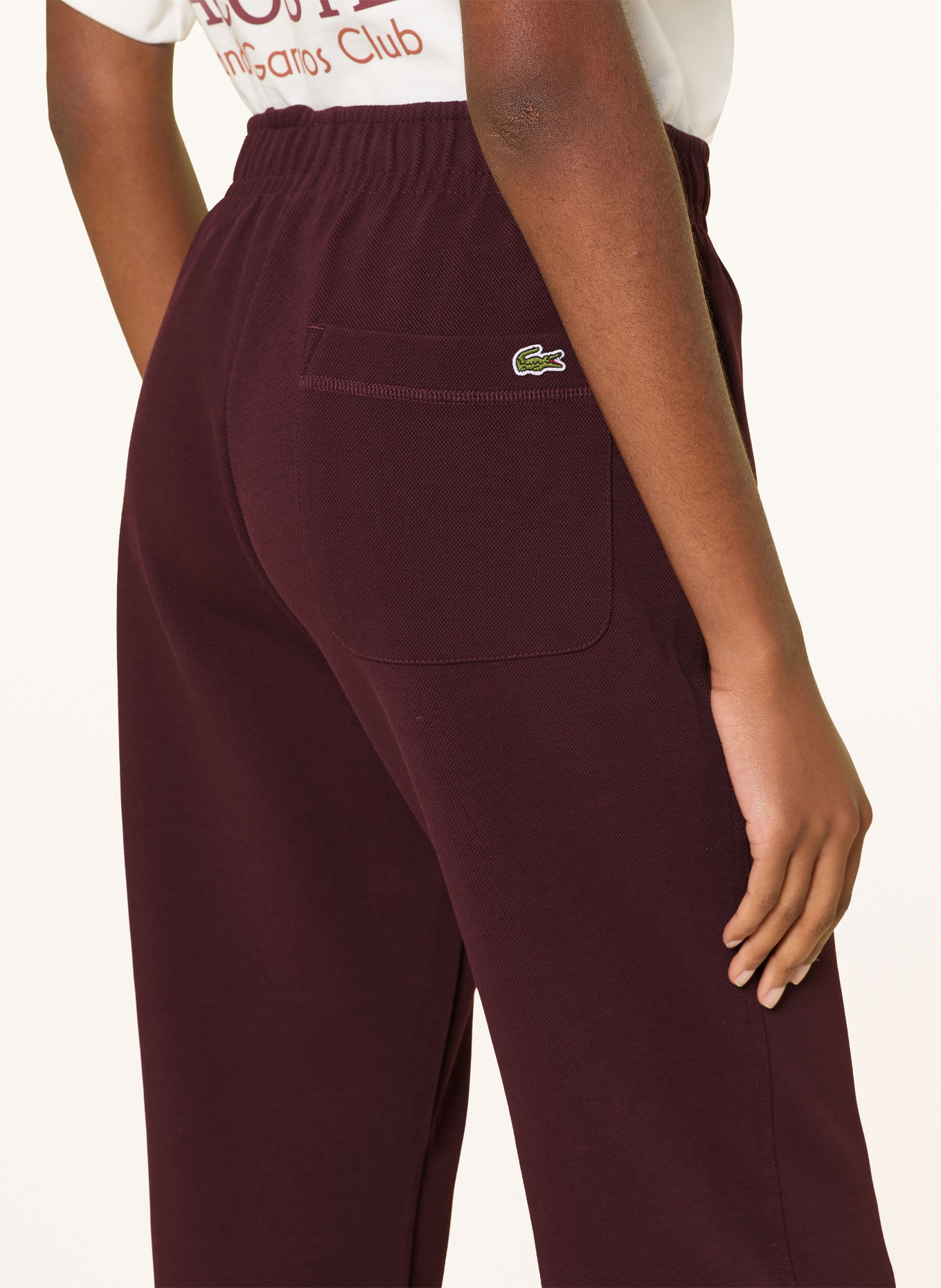 LACOSTE Broek: DONKERROOD