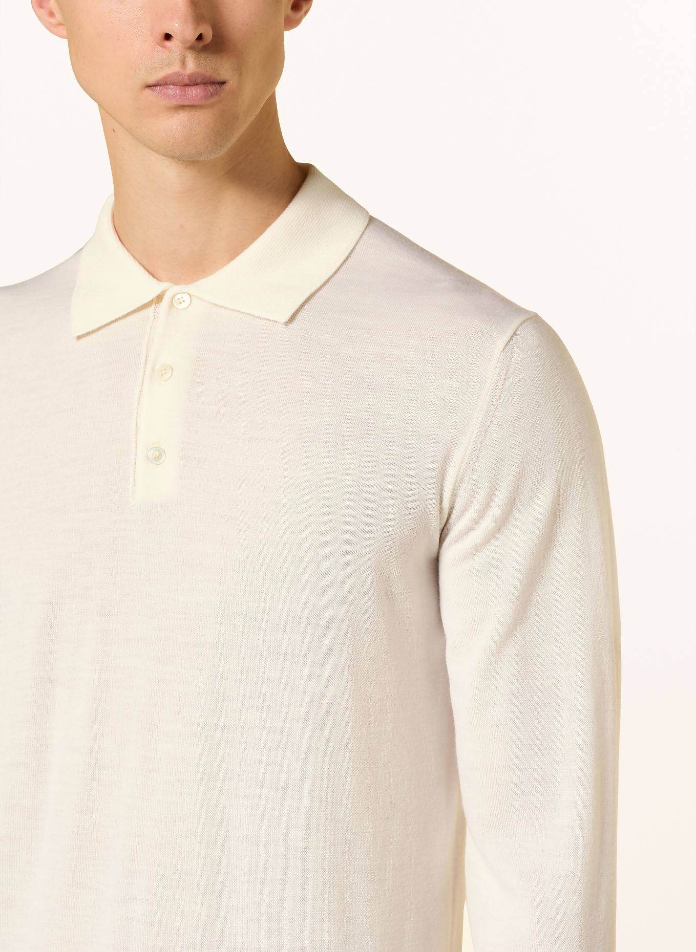 CRUNA Gebreid poloshirt: CRÈME