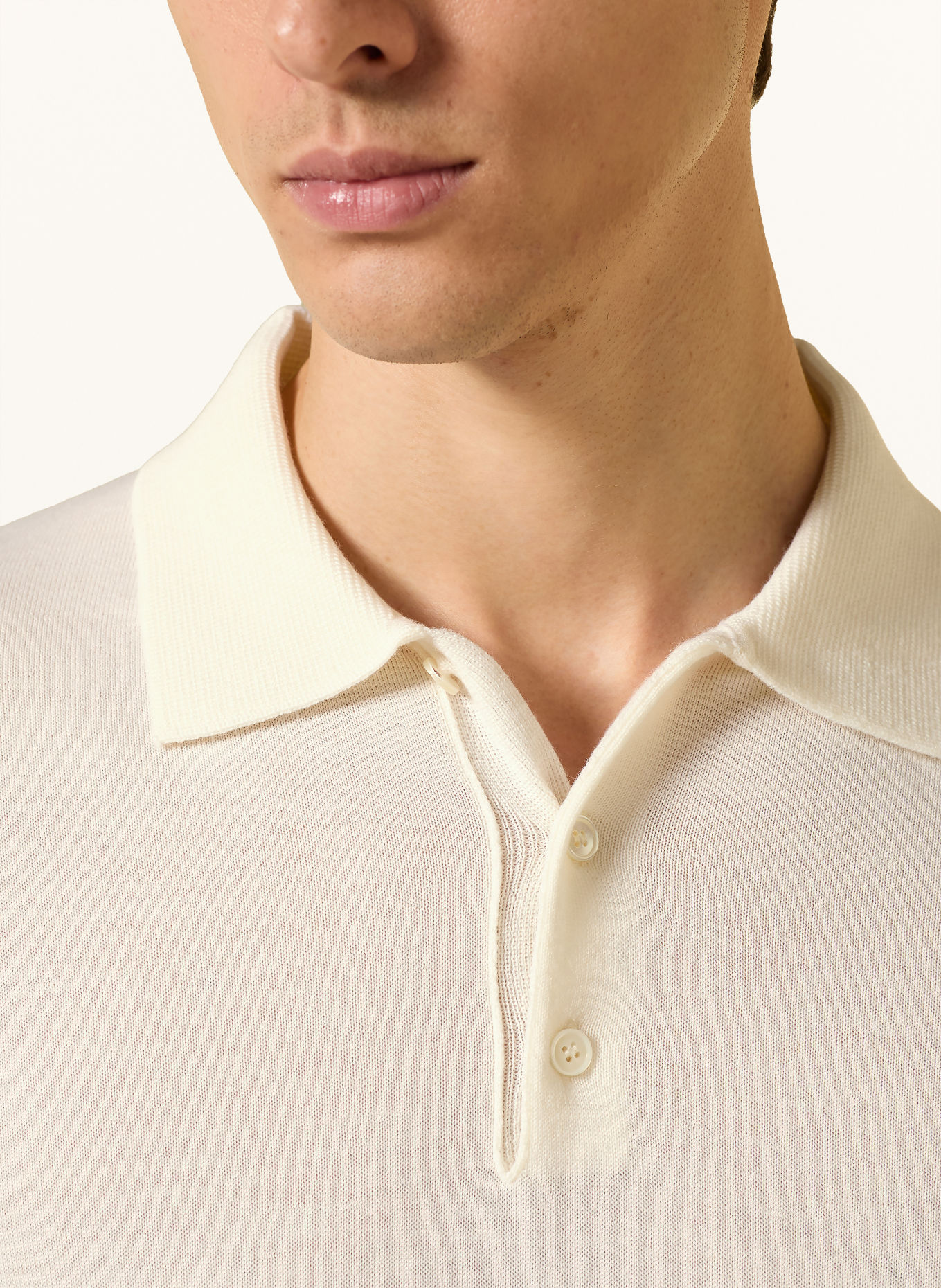 CRUNA Gebreid poloshirt: CRÈME