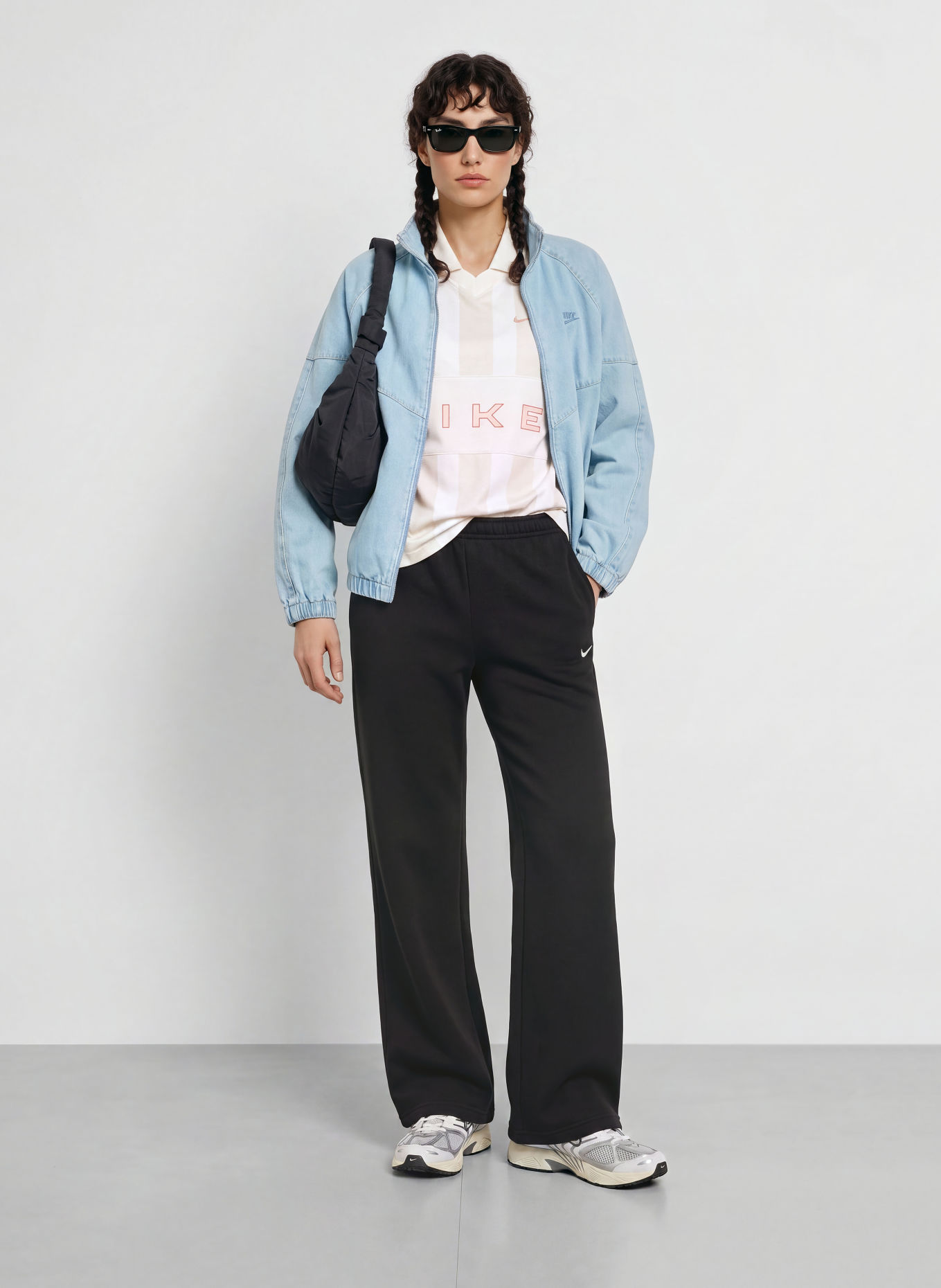Nike Spodnie dresowe STUDIO FLEECE: CZARNY