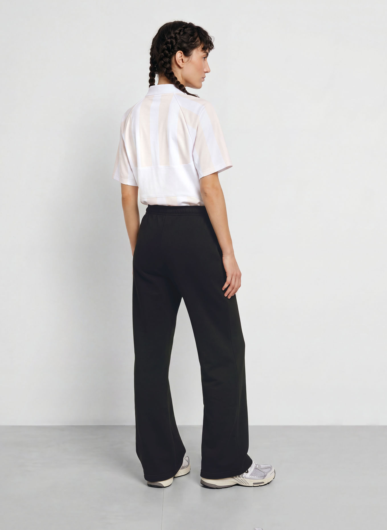 Nike Spodnie dresowe STUDIO FLEECE: CZARNY