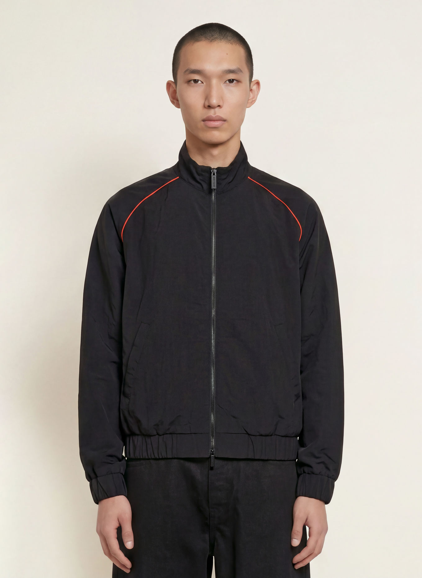 WRSTBHVR Blouson JALE: ZWART / NEONORANJE