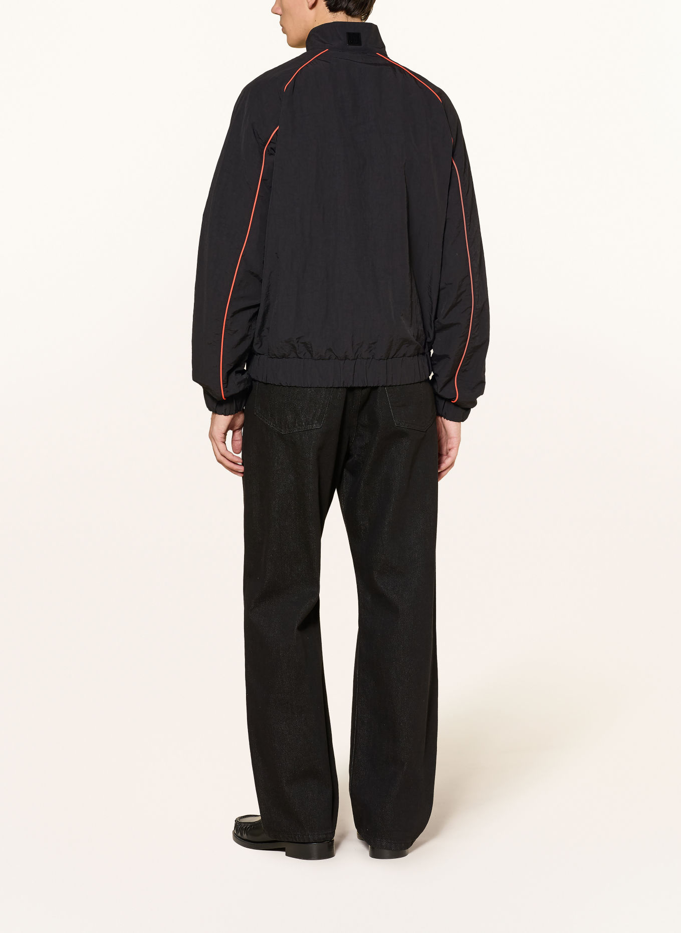 WRSTBHVR Blouson JALE: ZWART / NEONORANJE