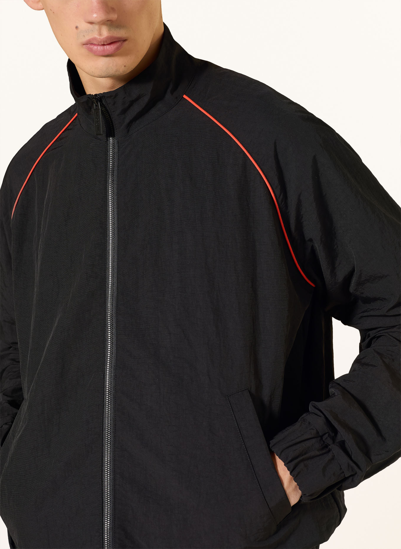 WRSTBHVR Blouson JALE: ZWART / NEONORANJE