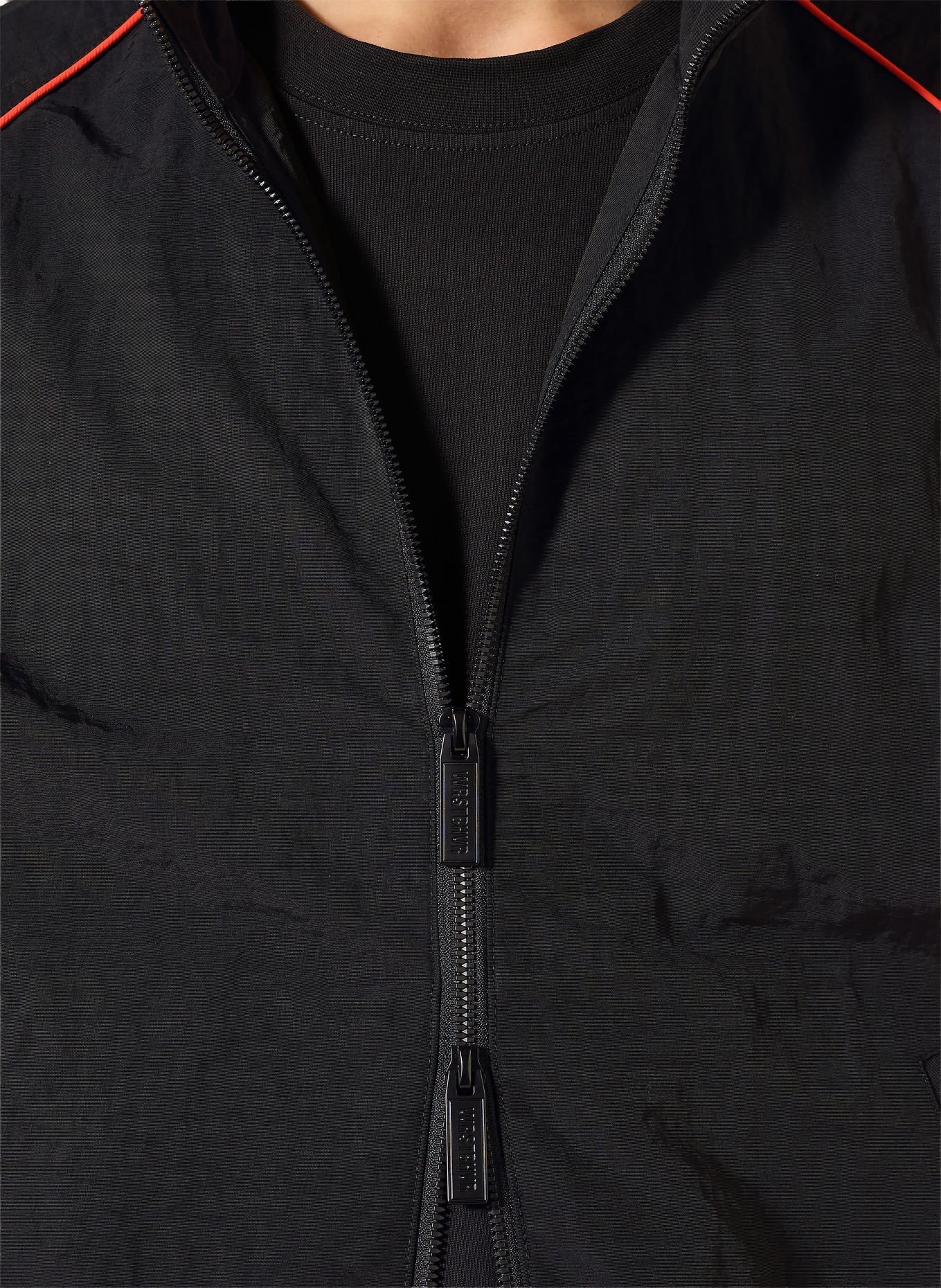WRSTBHVR Blouson JALE: ZWART / NEONORANJE