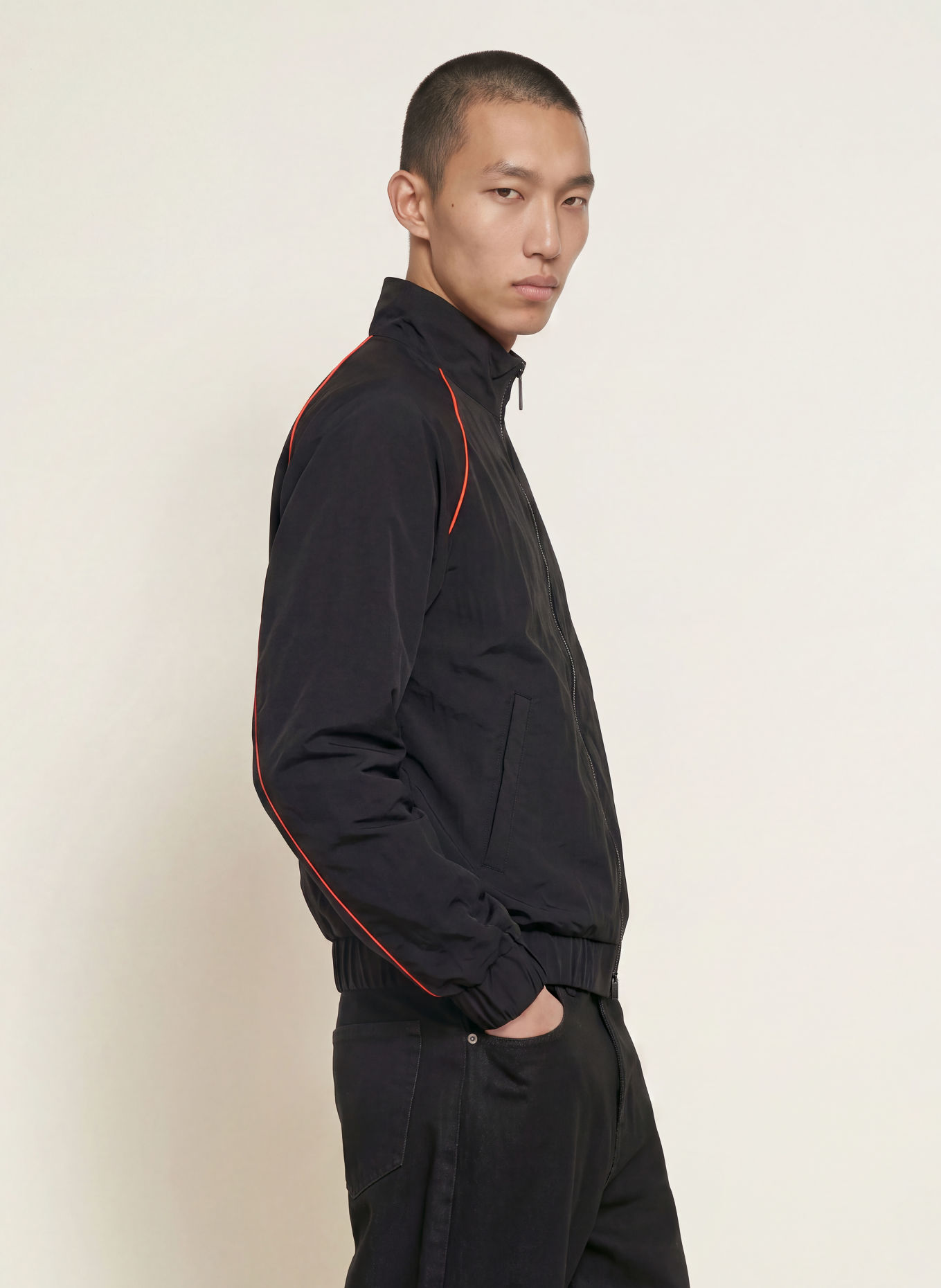 WRSTBHVR Blouson JALE: ZWART / NEONORANJE