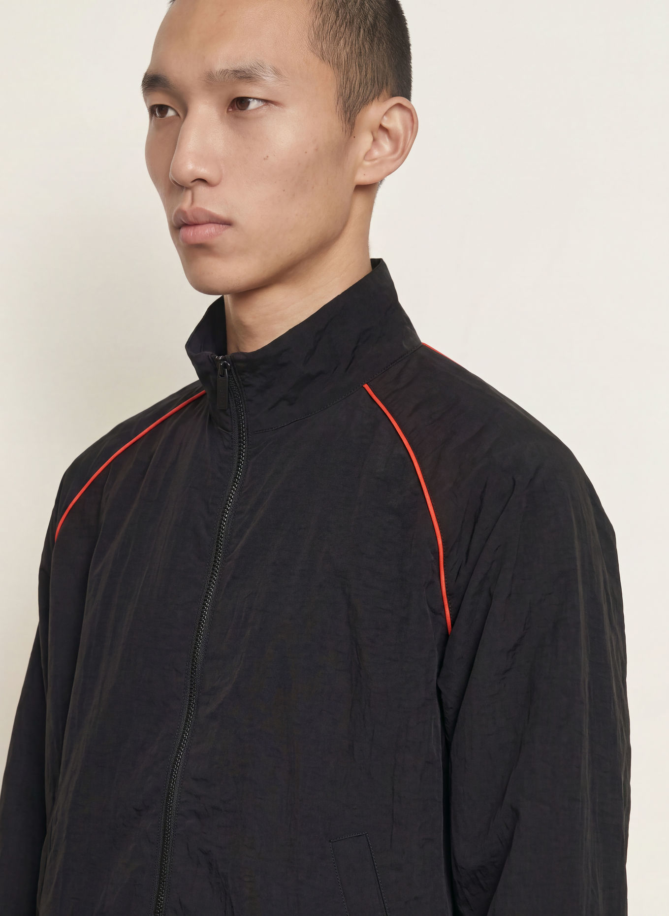 WRSTBHVR Blouson JALE: ZWART / NEONORANJE