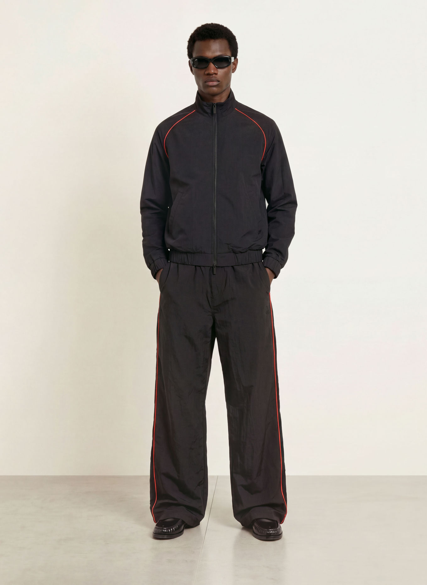 WRSTBHVR JALE Training Pants with Braided Stripes: BLACK / RED