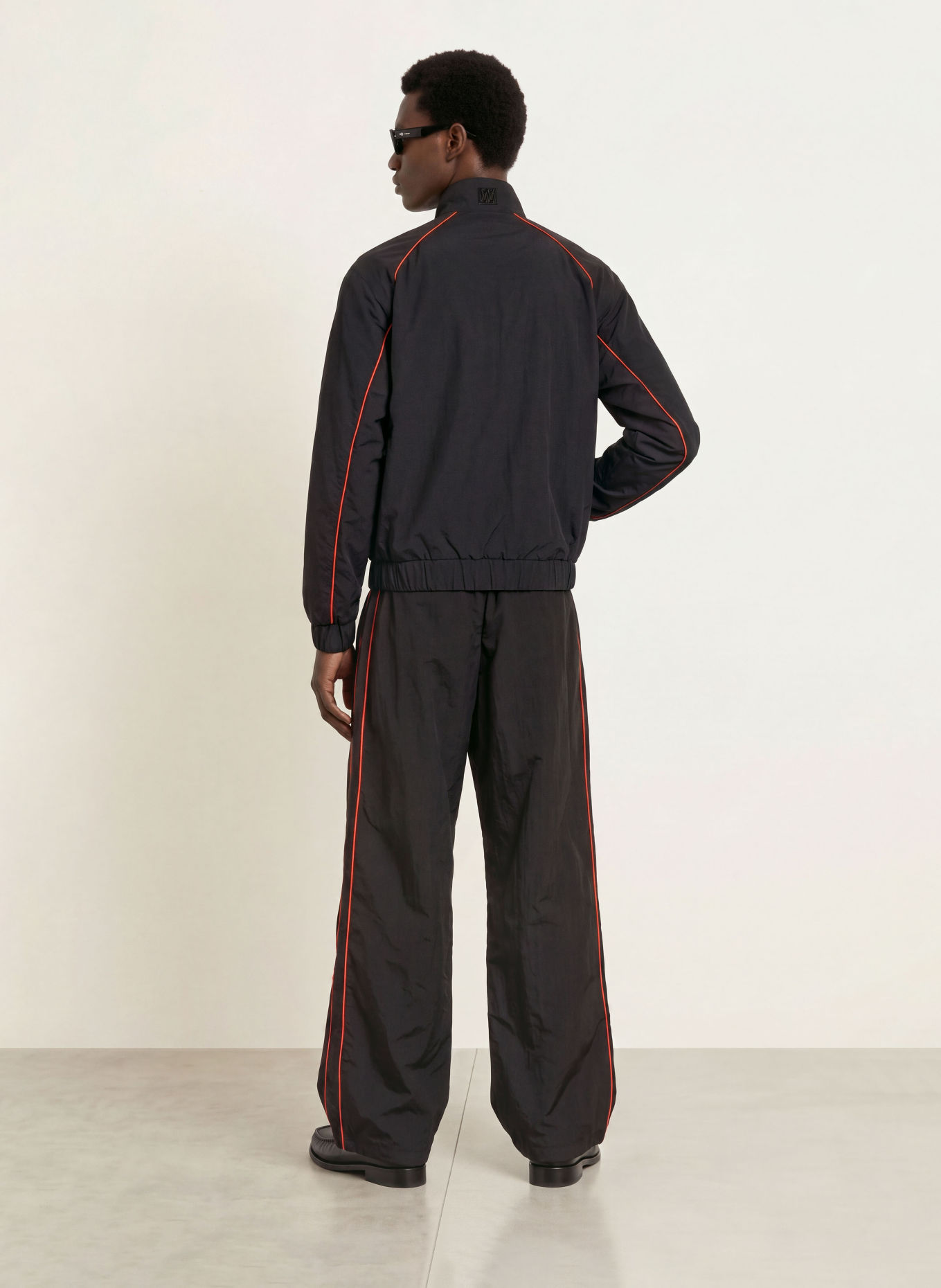 WRSTBHVR JALE Training Pants with Braided Stripes: BLACK / RED